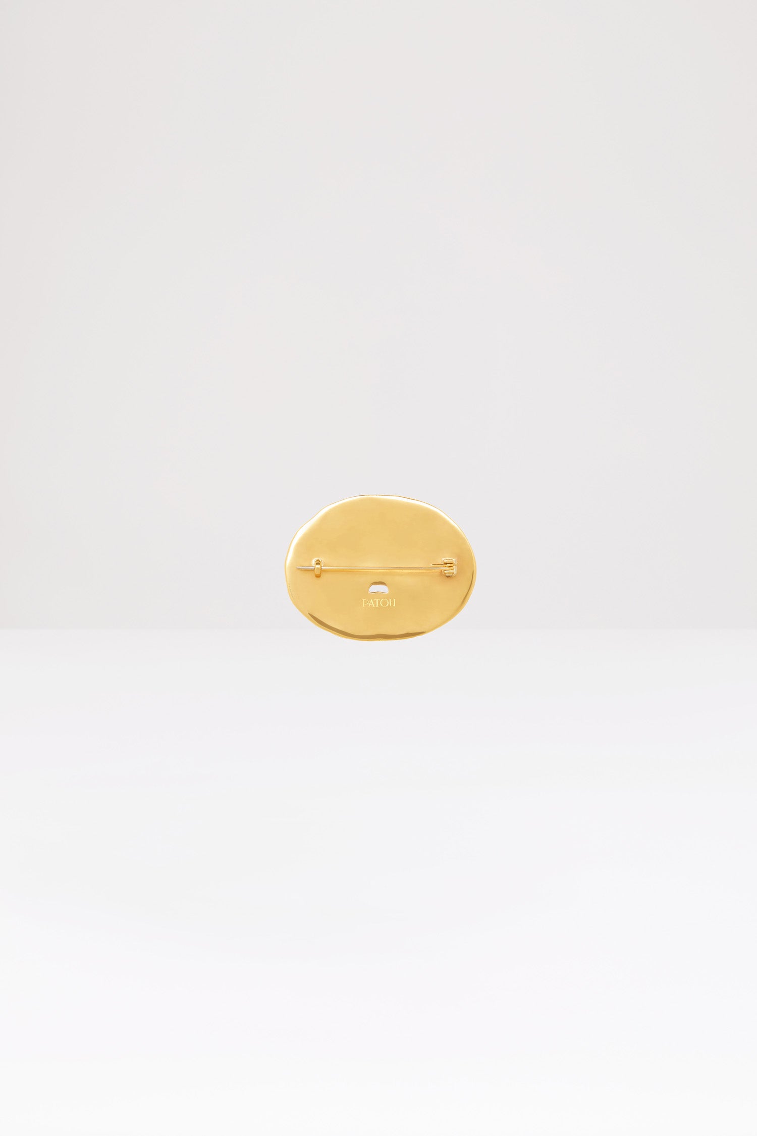 Patou - Maxi oval face brass brooch - Gold - A timeless icon becomes the face of contemporary jewellery.Maxi oval brass brooch with a “Bocca della Verità”-inspired design.
