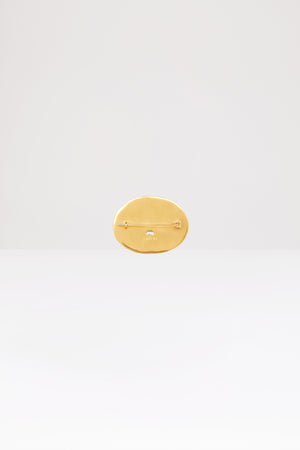 Maxi oval face brass brooch