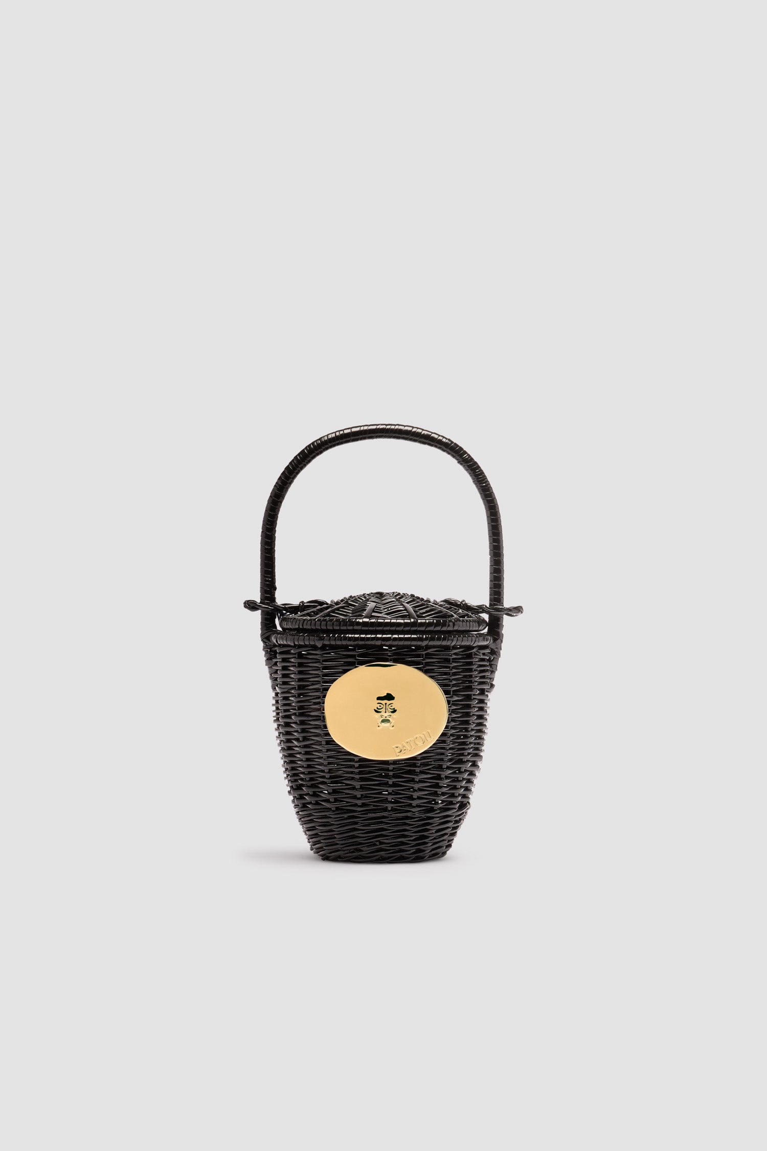 Patou - ウィッカー バケツバッグ - Black - ブラックのウィッカー バケツバッグ。スライドリッド付きのトップハンドル。「真実の口」から着想を得たゴールドカラーの装飾。このバスケットは手作りです。均一ではなく、製品ごとに独自の趣きを持っています。