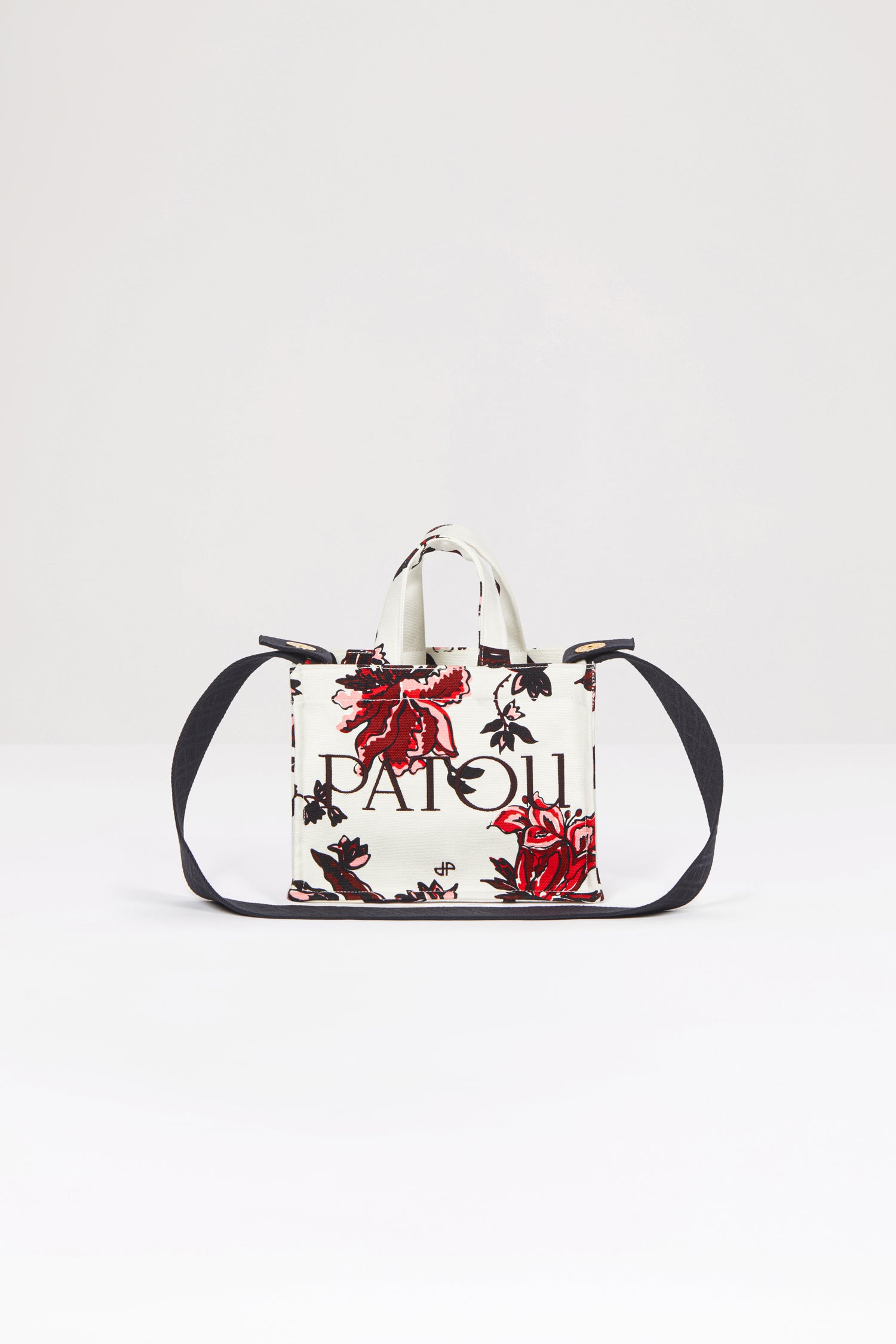 Patou - Small Patou tote in printed organic cotton - Indian Winter - A little Patou goes a long way.Printed organic cotton tote. Seasonal Indian Winter motif. Patou lettering logo and JP monogram. Embossed shoulder strap with gold buttons. Two top handles. Can be carried by hand or on the shoulder.