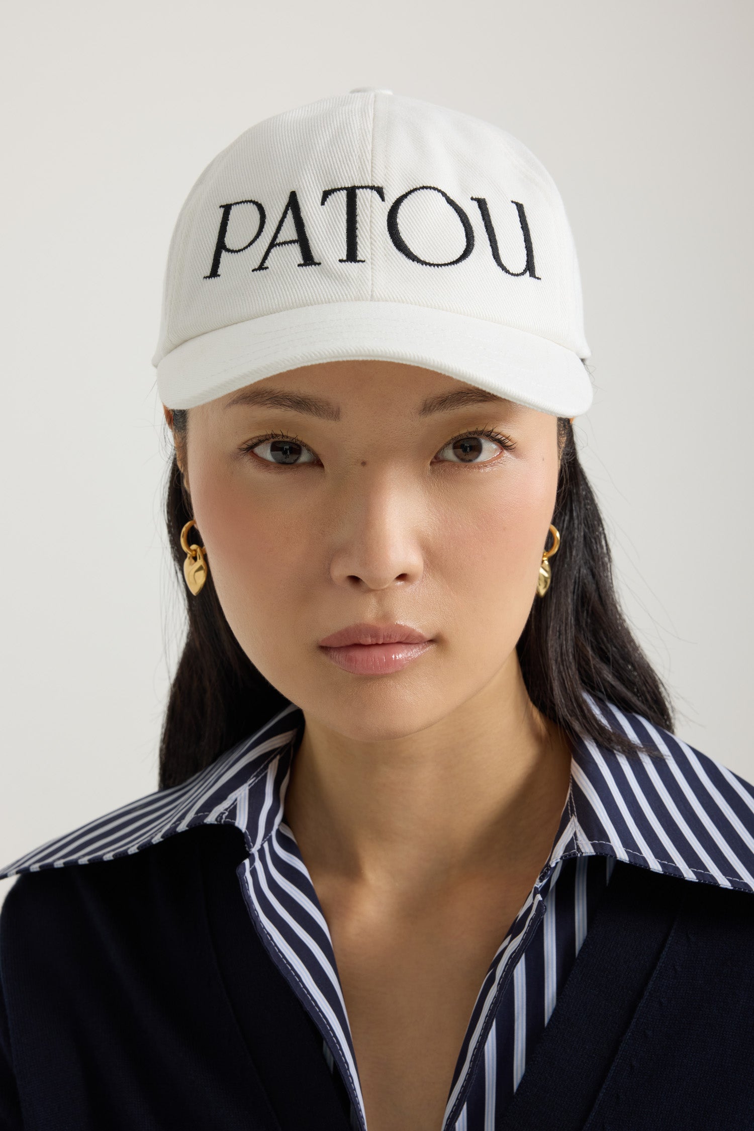 Patou - Patou cap in cotton - Cream - Do you Patou?Cream cotton baseball hat. Black Patou logo at the front. Elasticated strap at the back. Unisex style.S: 55 cm circumferenceM: 57 cm circumferenceL: 59 cm circumference