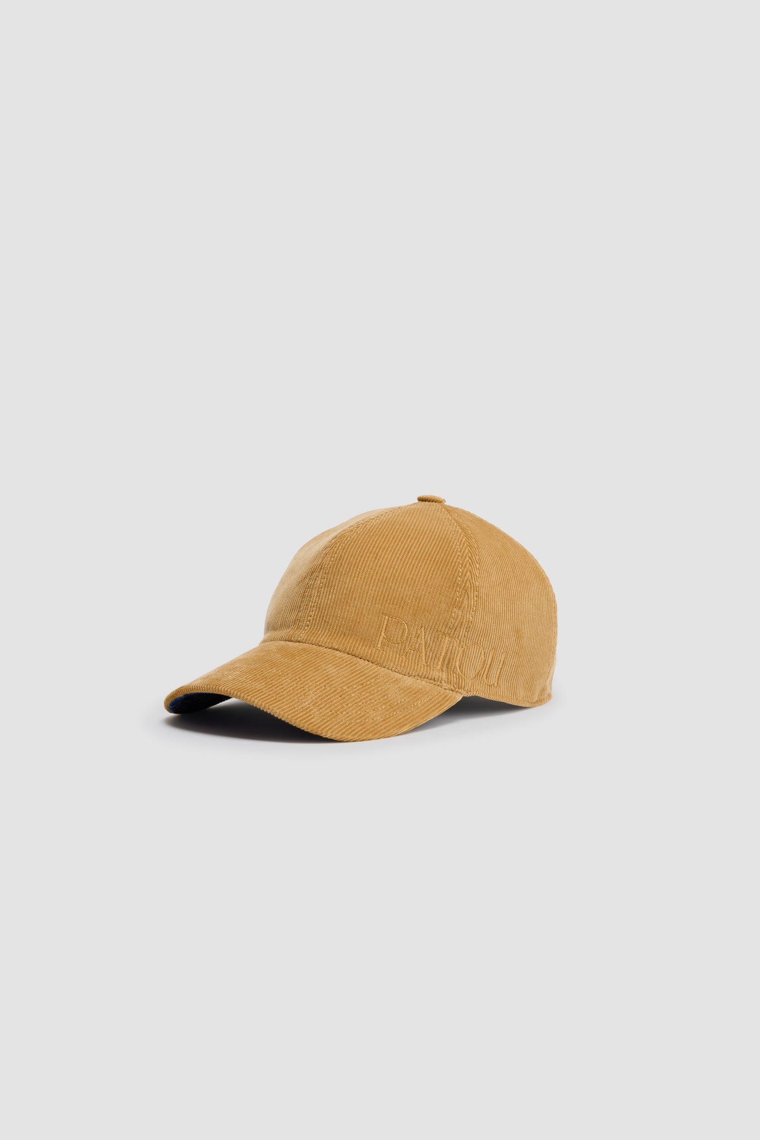Patou - Patou cap in cotton corduroy - Gold - Gold yellow cotton corduroy baseball hat. Patou embroidery at the side. Elasticated strap at the back. JP monogram denim on the underbrim. Unisex style.Sizing:S: 55 cm circumferenceM: 57 cm circumferenceL: 59 cm circumference