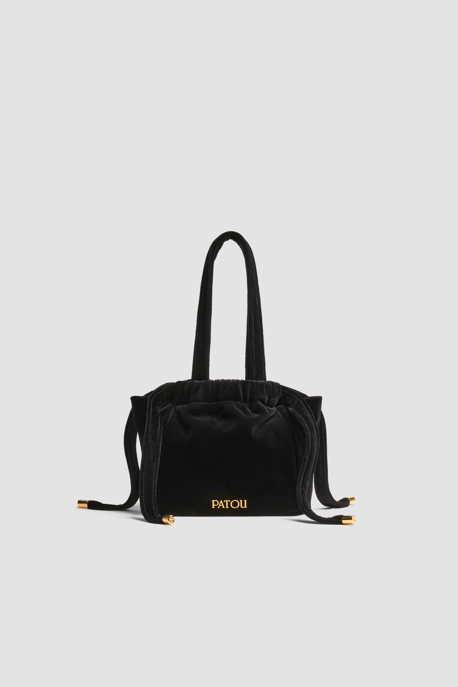 Patou - Evening pouch in cotton velvet - Black - Black cotton velvet pouch. Drawstring lace fastening. Top handles. Gold-tone metal Patou logo. Lined.