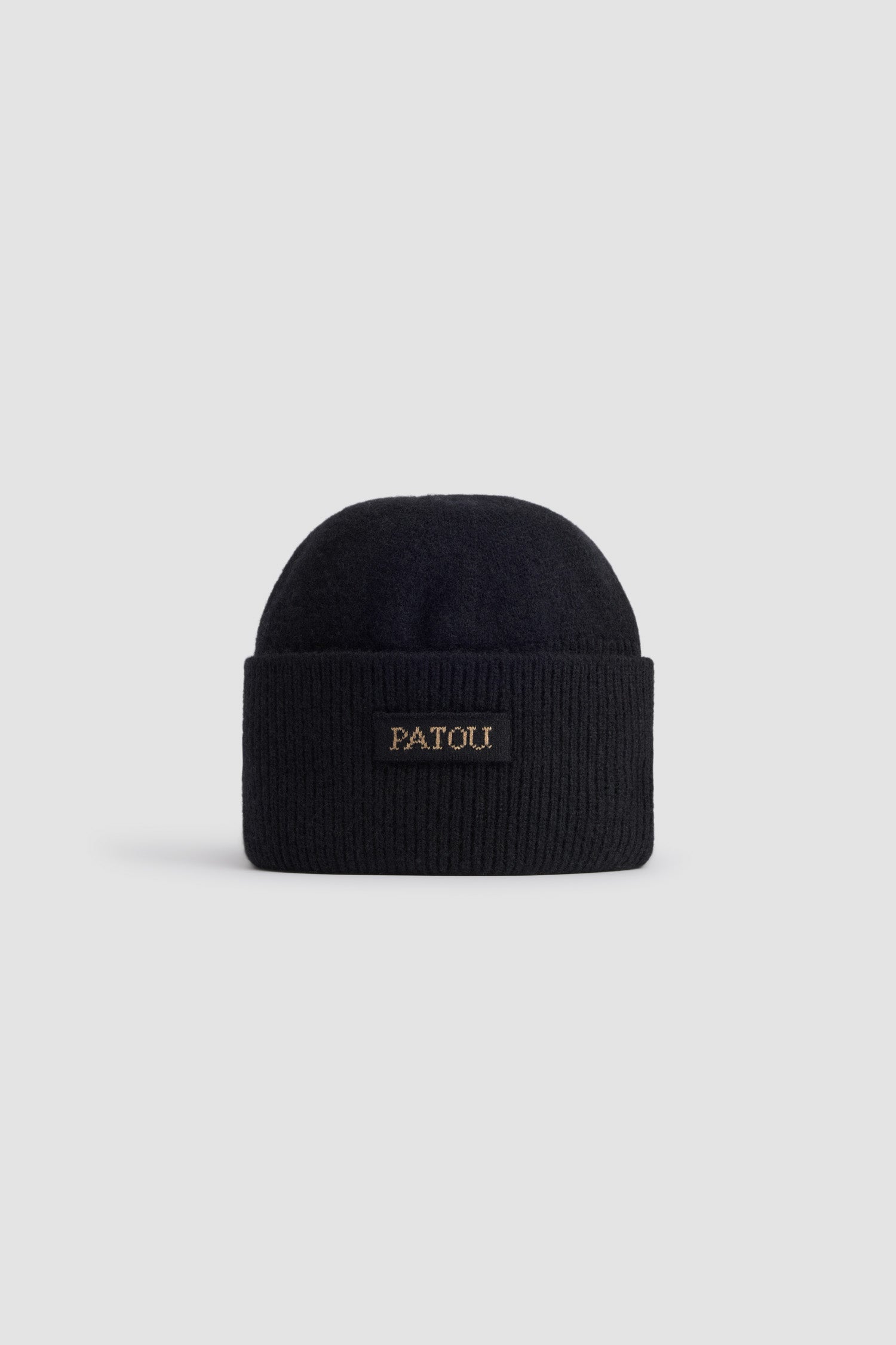 Patou - Patou beanie in sustainable wool and cashmere - Black - Black sustainable wool and cashmere beanie. Plain and rib knit. Patou jacquard label at the front.