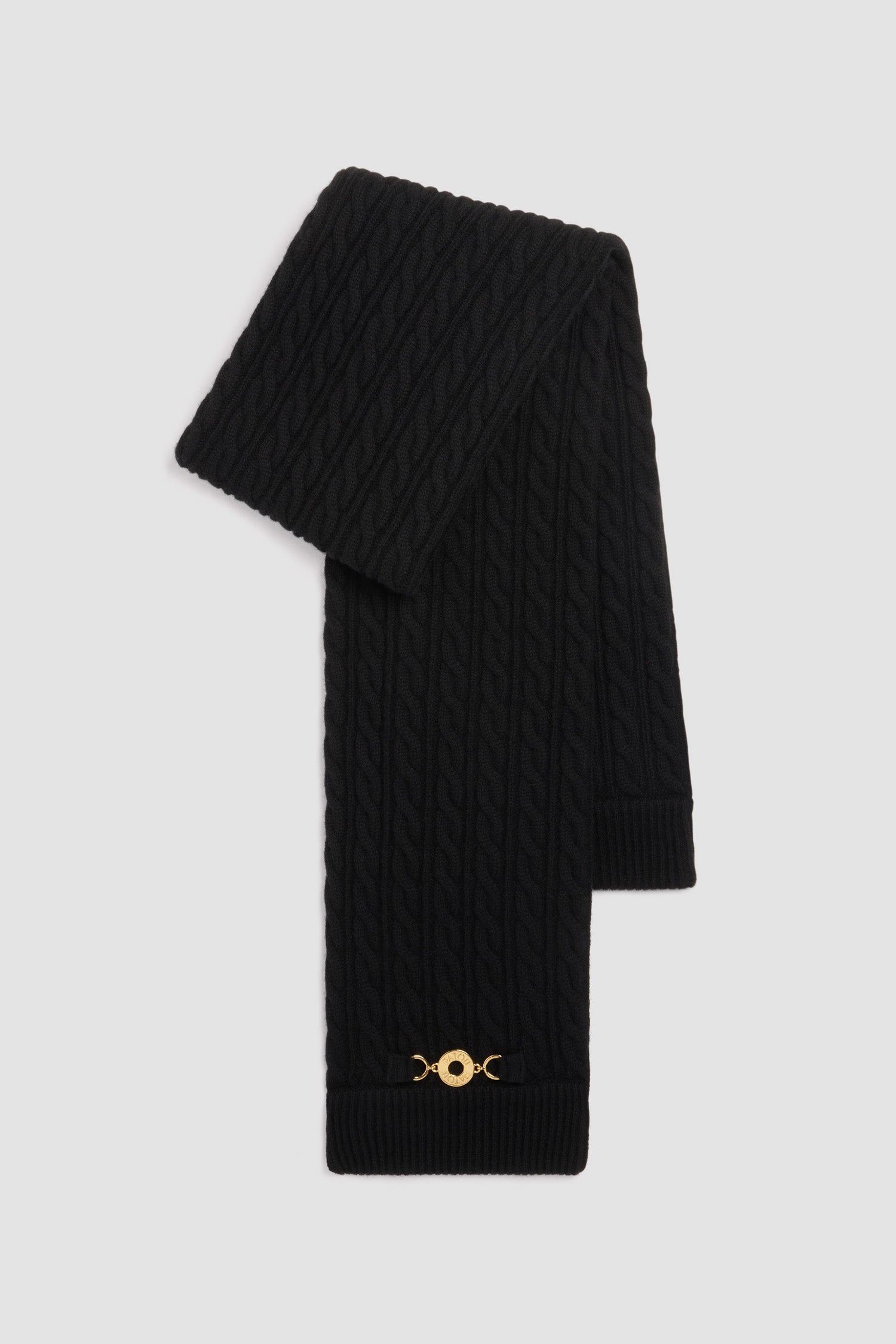 Patou - Cable knit scarf in wool and cashmere - Black - Black Merino wool and cashmere scarf. Cable knit. Ribbed edges. Gold-tone Patou logo-engraved medallion embellishment at the front.
