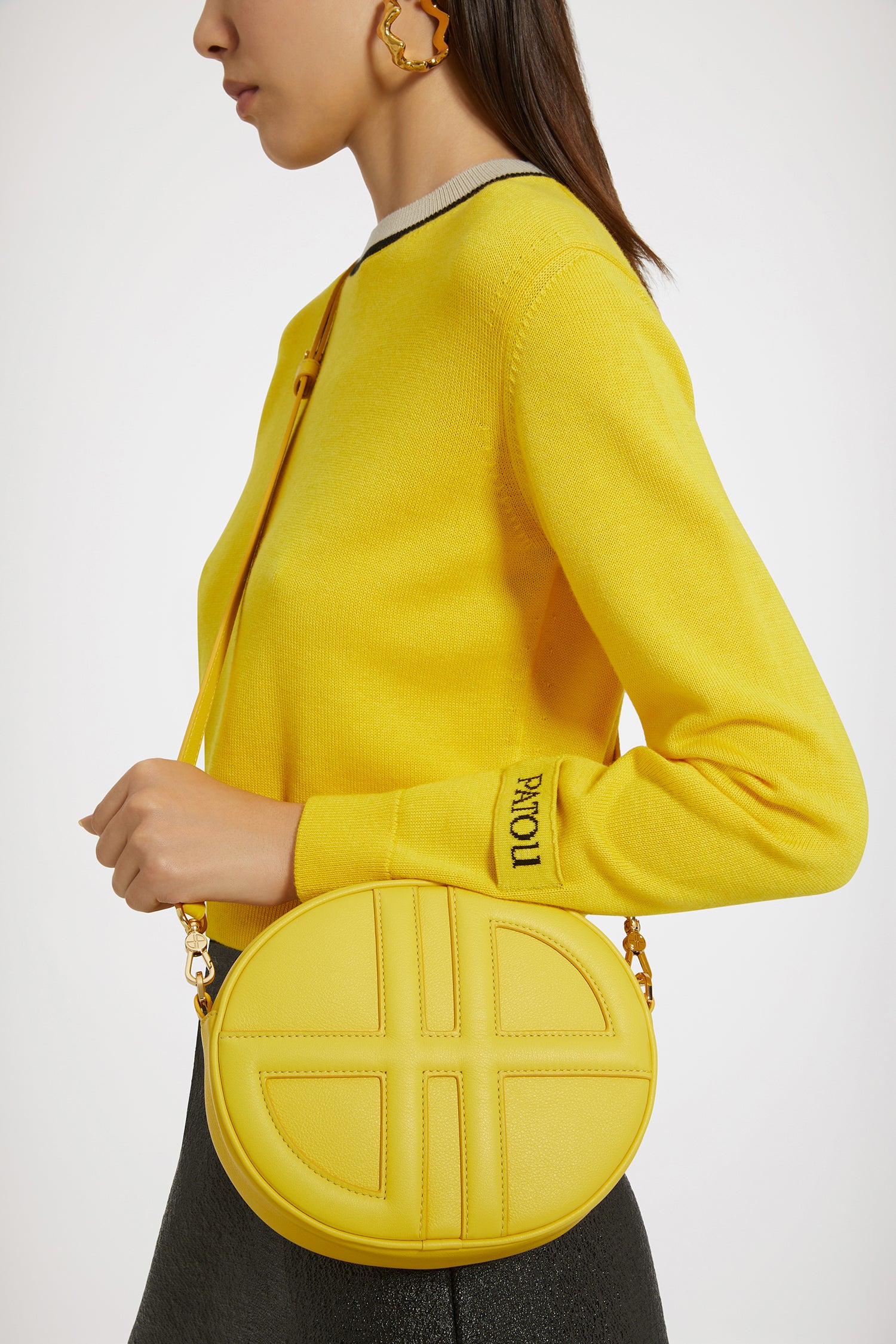 Patou - Le JP bag in leather - Yellow - A darling newcomer to covet and carry the world over.Yellow leather handbag. Crafted using unique materials sourced from unused high-quality leather hides. 40 limited numbered edition. Oval shape with a foam-padded 3D JP monogram at the front. Embossed Patou at the back. Two-way zip fastening. Single inside pocket. Detachable and adjustable strap. Gold-tone hardware. Eco lining.Measures: 21 cm (length), 18 cm (height), 7 cm (depth)Adjustable strap: 66 cm-110 cm