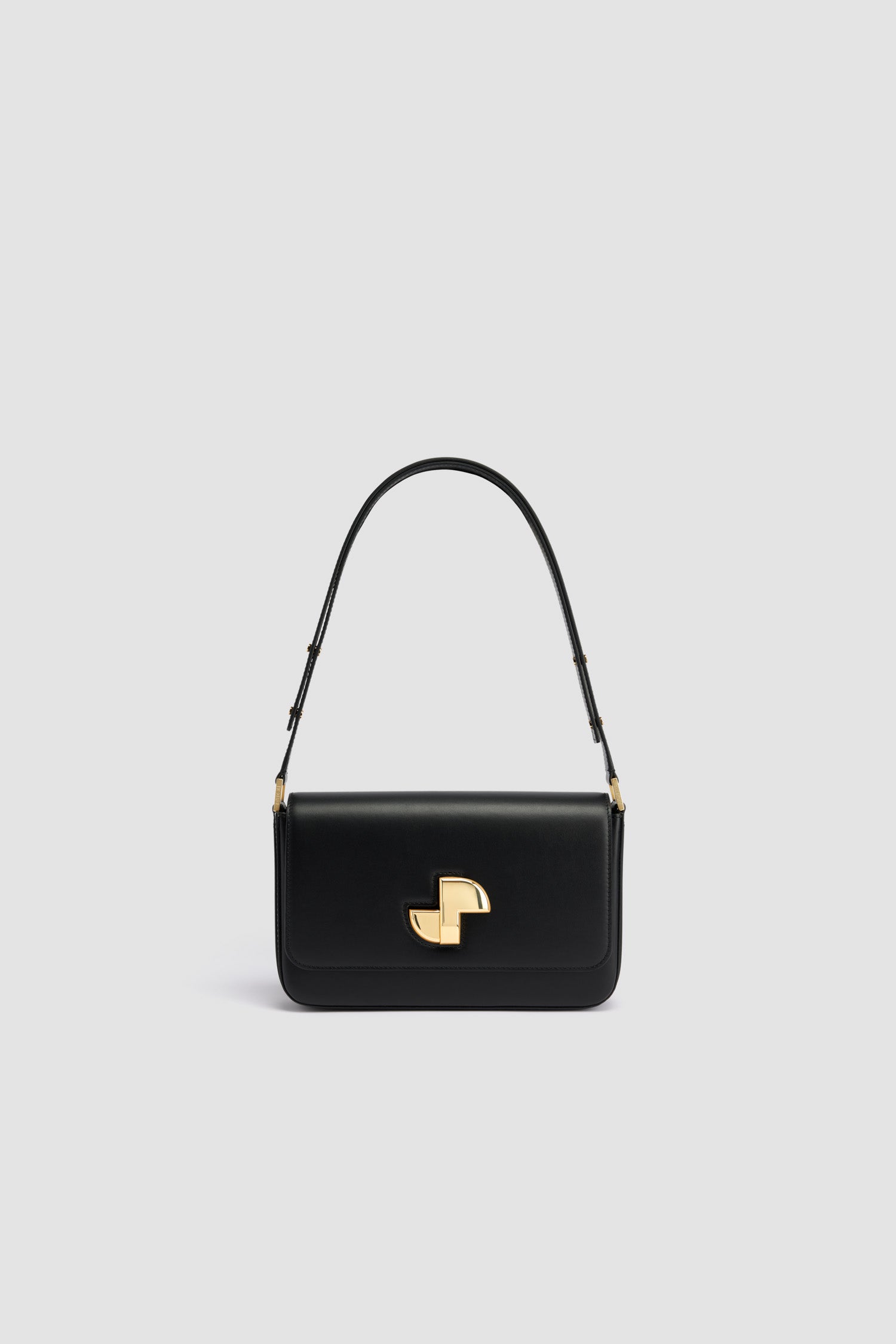 Patou - Le Classic Lock in pelle - Black - Borsa in pelle nera. Borsa da giorno classica rivisitata. Fermaglio girevole JP oro in stile Art Déco sul davanti. Tracolla regolabile che può essere indossata lunga o corta. Fodera in pelle.