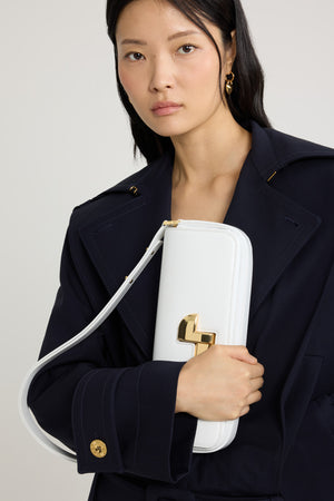 Le Lock Baguette bag in leather