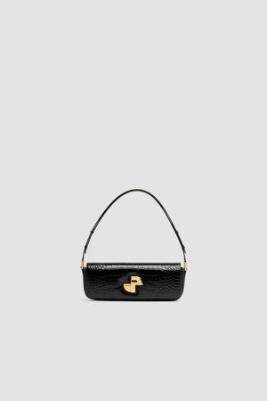 Le Lock Baguette bag in crocodile-embossed leather
