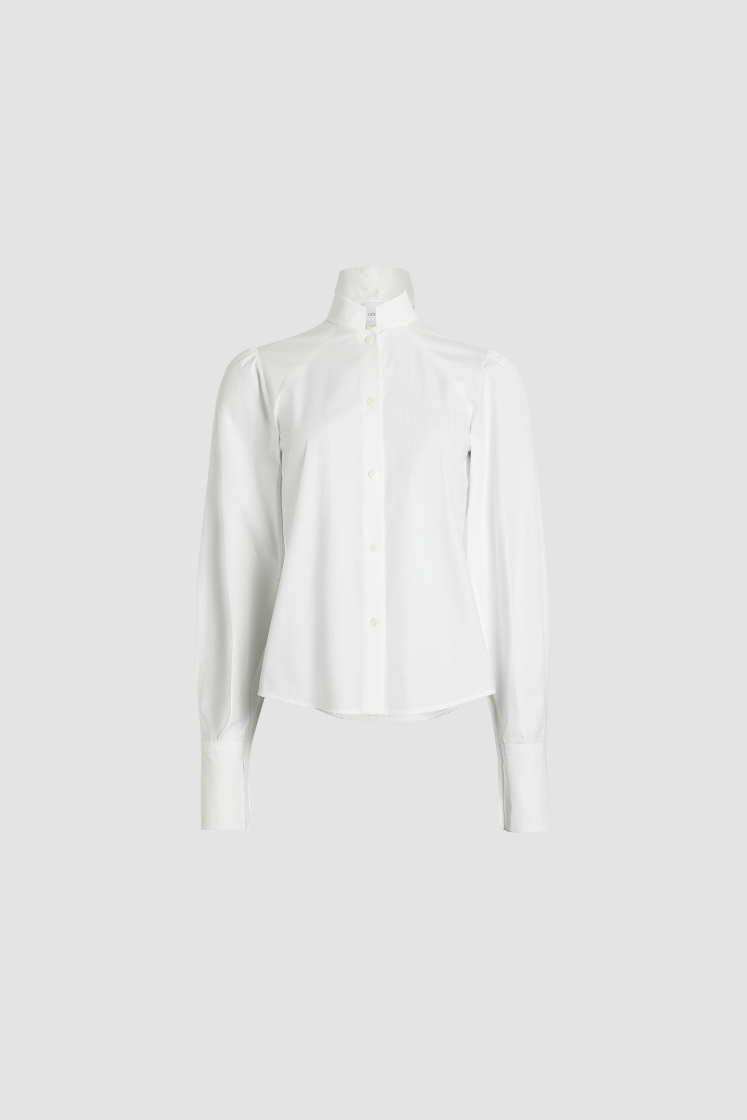 Patou - Lavallière blouse in organic cotton - White - White organic cotton blouse. Stand collar with removable lavallière bow. JP-engraved mother-of-pearl buttons. Volume raglan sleeves with puff shoulders and buttoned French cuffs.