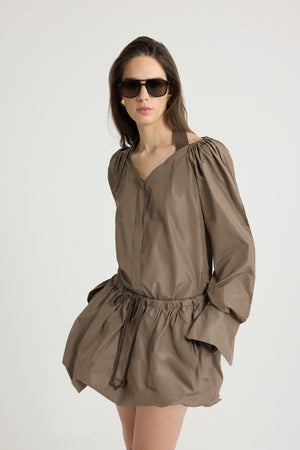 Blusa incrociata in faglia riciclato