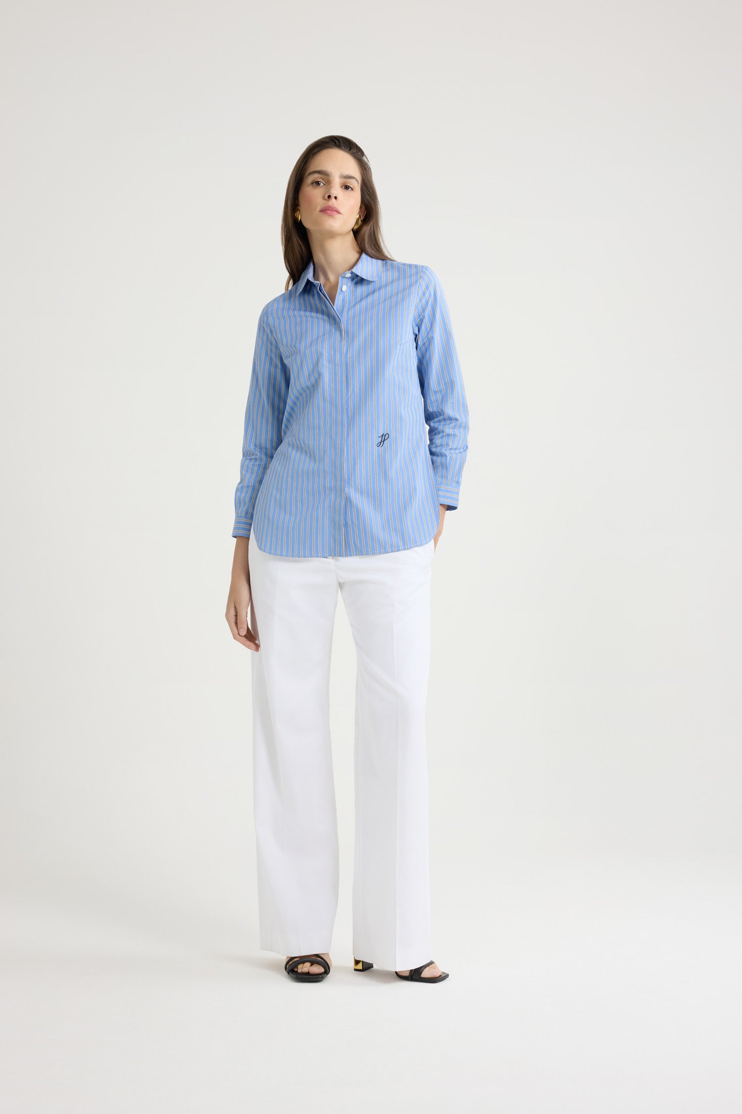 Patou - Tailored shirt in printed organic cotton poplin - Heritage Blue Stripes - Heritage Blue organic cotton poplin shirt. Striped pattern. Peter Pan collar. Concealed button front fastening. Cropped sleeves with buttoned cuffs. Embroidered JP calligraphy monogram at the front. Asymmetric front to back hem.