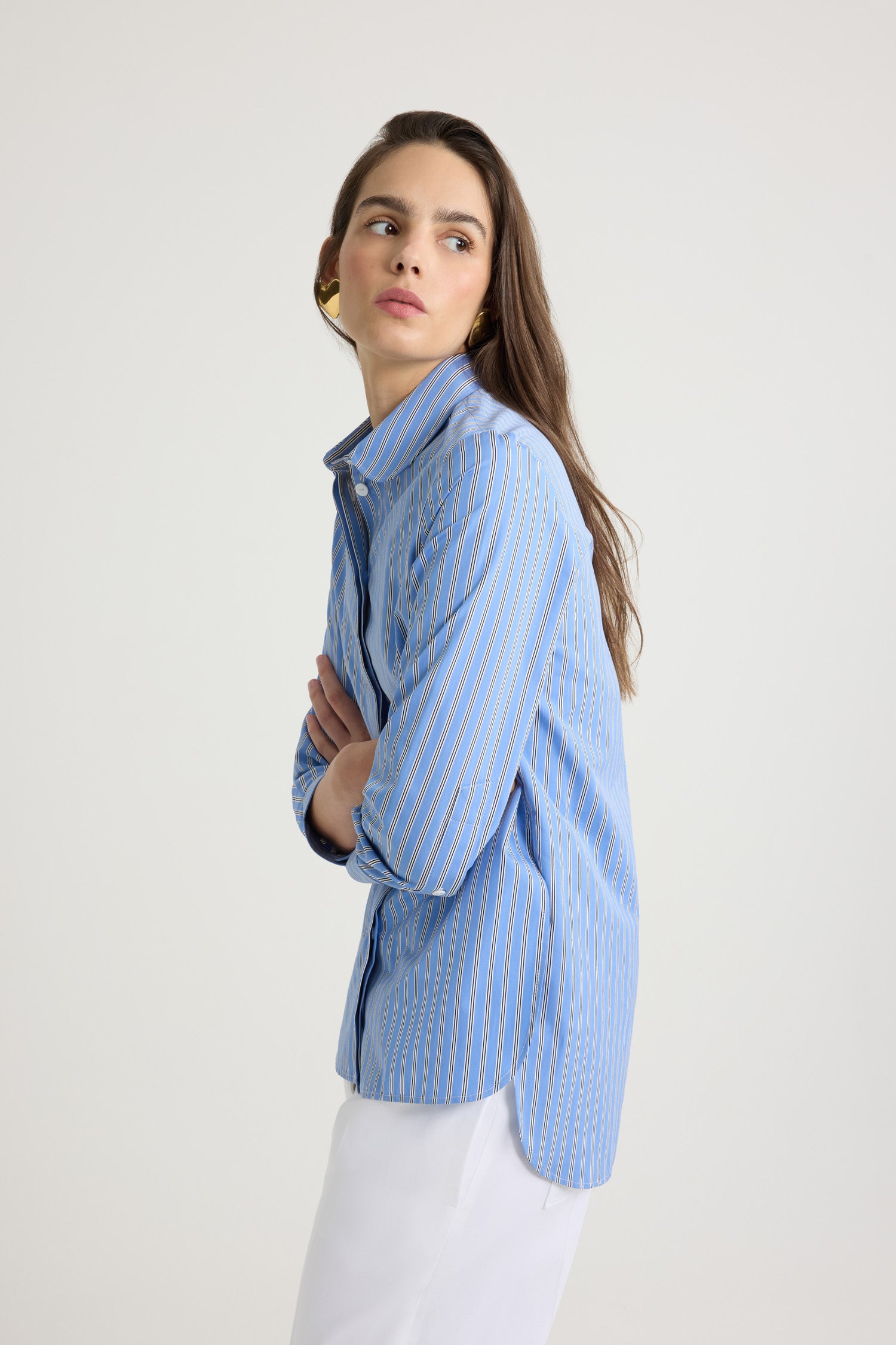 Patou - Tailored shirt in printed organic cotton poplin - Heritage Blue Stripes - Heritage Blue organic cotton poplin shirt. Striped pattern. Peter Pan collar. Concealed button front fastening. Cropped sleeves with buttoned cuffs. Embroidered JP calligraphy monogram at the front. Asymmetric front to back hem.