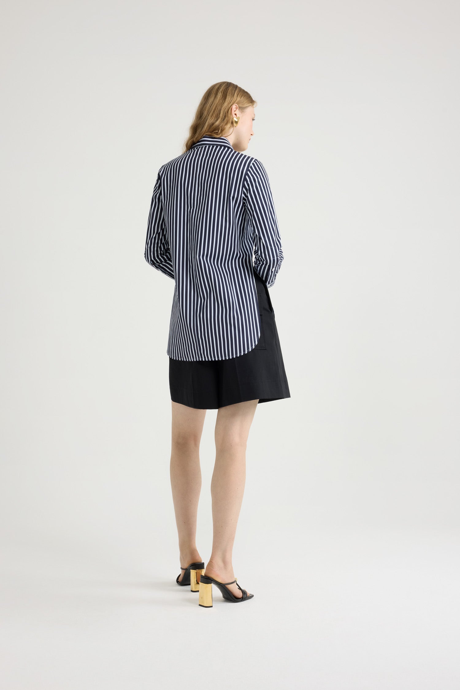 Patou - Tailored shirt in printed organic cotton poplin - Navy Stripes - Navy organic cotton poplin shirt. Striped pattern. Peter Pan collar. Concealed button front fastening. Cropped sleeves with buttoned cuffs. Embroidered JP calligraphy monogram at the front. Asymmetric front to back hem.