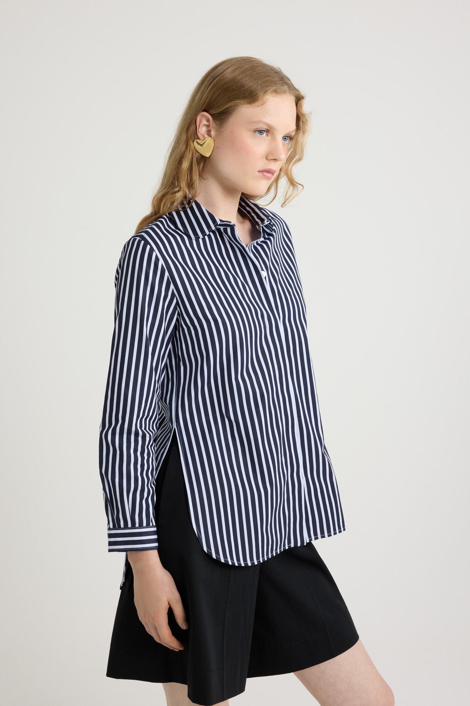 Patou - Tailored shirt in printed organic cotton poplin - Navy Stripes - Navy organic cotton poplin shirt. Striped pattern. Peter Pan collar. Concealed button front fastening. Cropped sleeves with buttoned cuffs. Embroidered JP calligraphy monogram at the front. Asymmetric front to back hem.