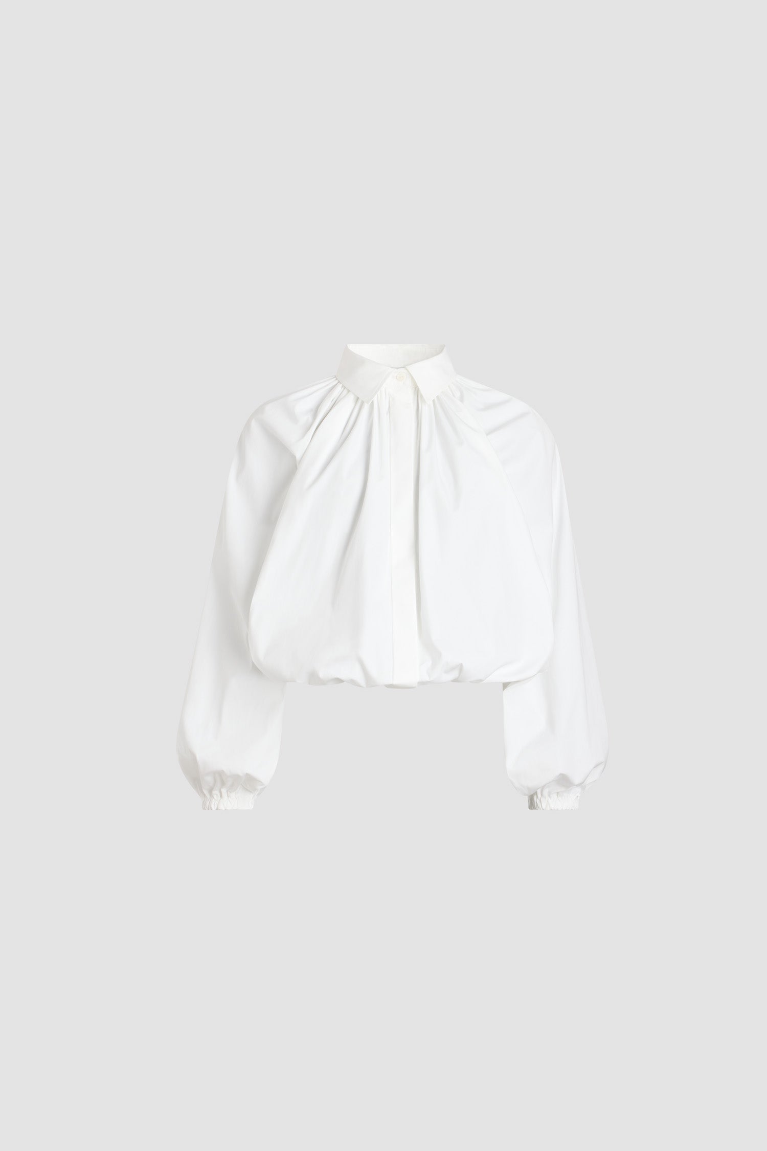 Patou - Bubble blouse in organic cotton poplin - White - White organic cotton blouse. Volume silhouette. Slightly cropped length. Classic shirt collar. Concealed button front fastening. Balloon sleeves with elasticated cuffs. Bubble hem.