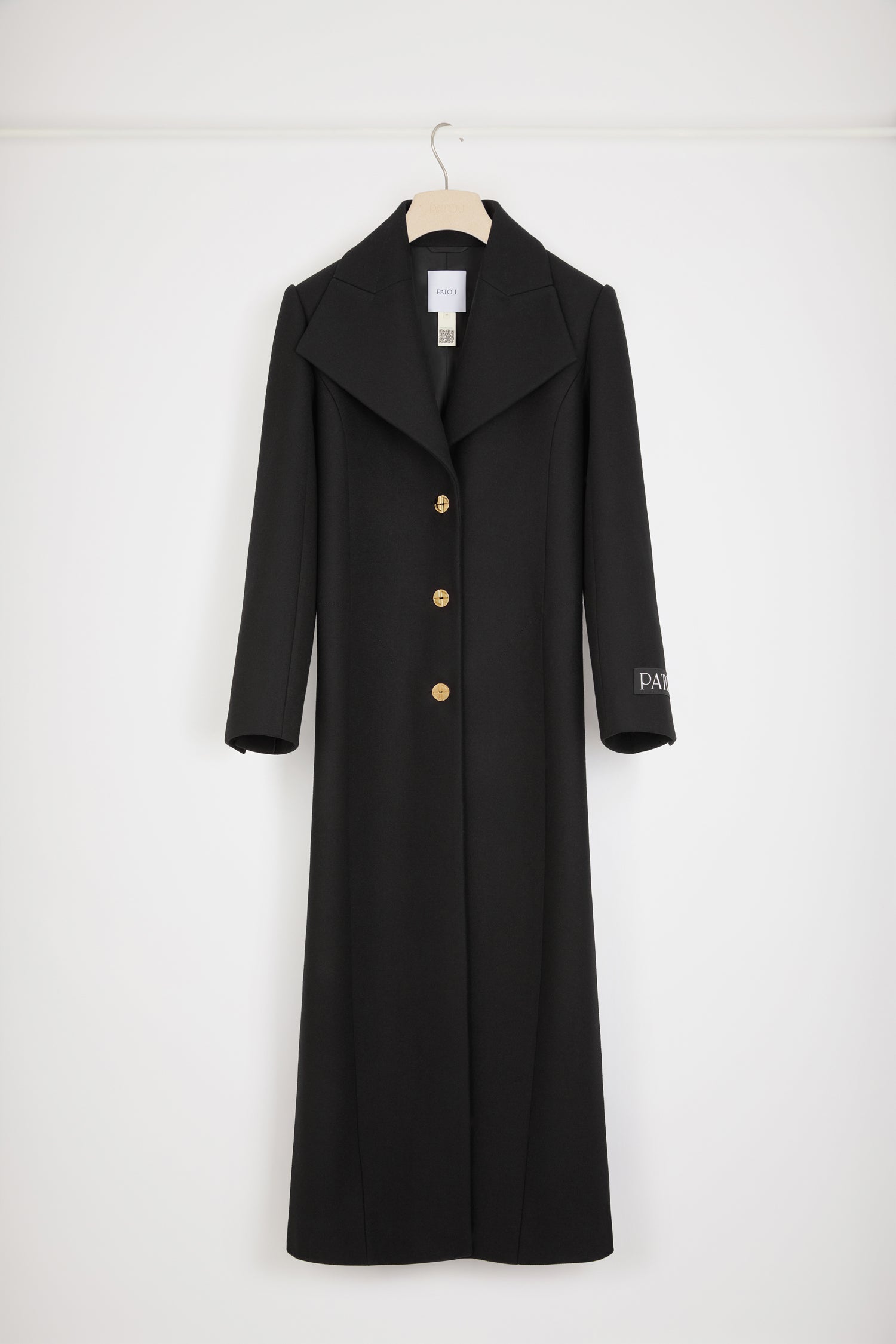 Patou - Cappotto lungo in feltro di misto lana - Black - Sartorialità parigina.Cappotto in feltro di misto lana nero. Modello lungo. Revers larghi. Spalline. Bottoni incisi JP in stile Art Déco. Tasche ai lati. Polsini con bottoni nascosti. Spacco sul retro. Bordo in raso sull'orlo. Modello foderato.Modello a spalline larghe.