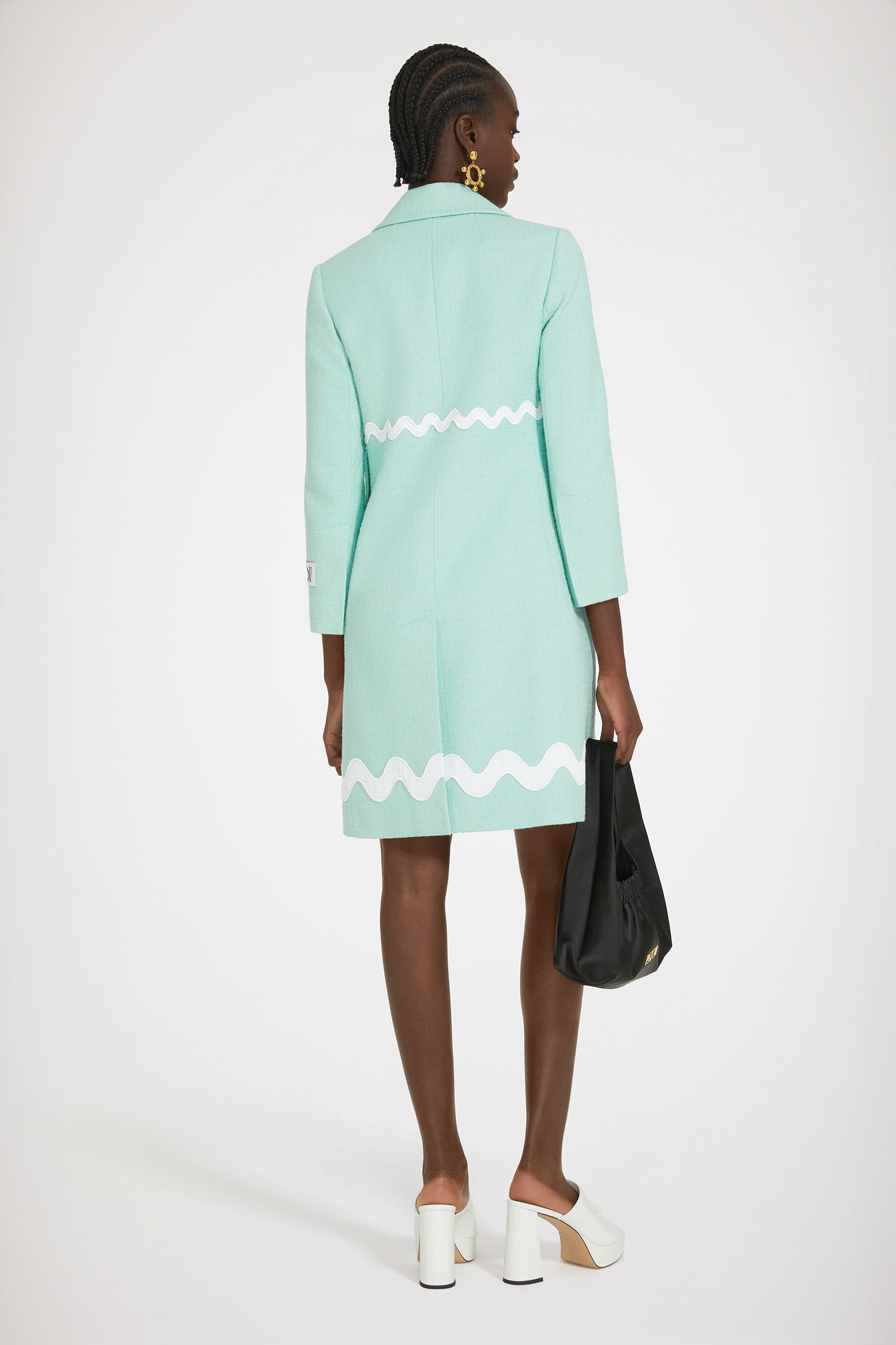 Patou - Wave summer coat in cotton tweed - Mint Green - The perfect summer layer.Mint green cotton tweed coat. Mid length. A-line silhouette. Single-breasted style with off-center placket. Notch lapels. Chest pocket. High flap pockets. Contrast wave trims. Gold-tone Patou-engraved buttons. Cropped sleeves. Patou label on the left sleeve.This style is very fitted. We suggest ordering one size up or wearing it over skintight layers.