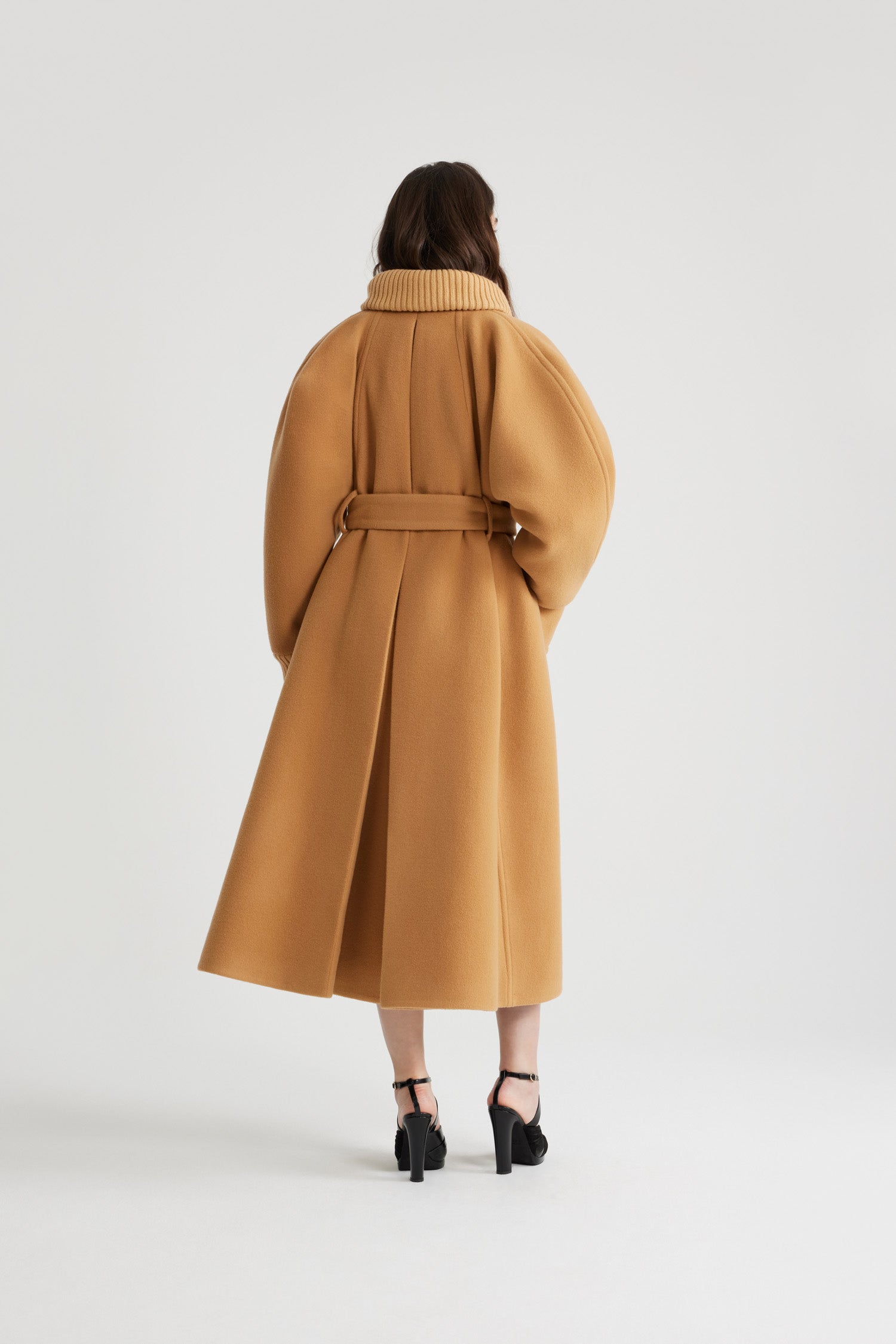 Patou - Oversized coat in wool and cashmere blend - Biscuit - Biscuit beige wool and cashmere blend coat. Oversized fit. Long length. A-line silhouette. Rib knit collar and cuffs. Raglan sleeves. Gold-tone half-sphere JP buttons. Self-tie belt at the waist. Maxi patch pockets with buttoned flap. Box pleat at the back.This style is oversized.