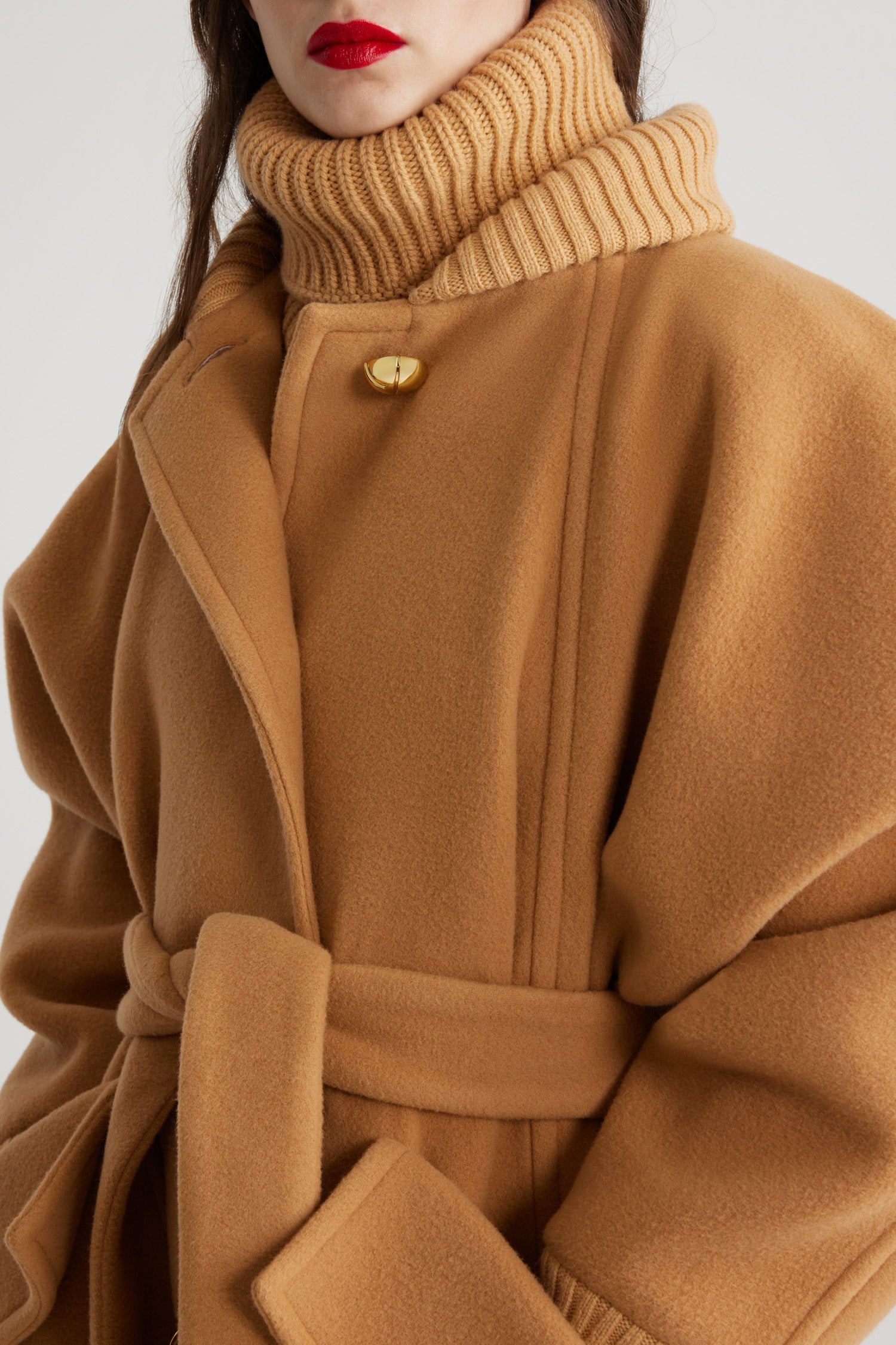 Patou - Oversized coat in wool and cashmere blend - Biscuit - Biscuit beige wool and cashmere blend coat. Oversized fit. Long length. A-line silhouette. Rib knit collar and cuffs. Raglan sleeves. Gold-tone half-sphere JP buttons. Self-tie belt at the waist. Maxi patch pockets with buttoned flap. Box pleat at the back.This style is oversized.