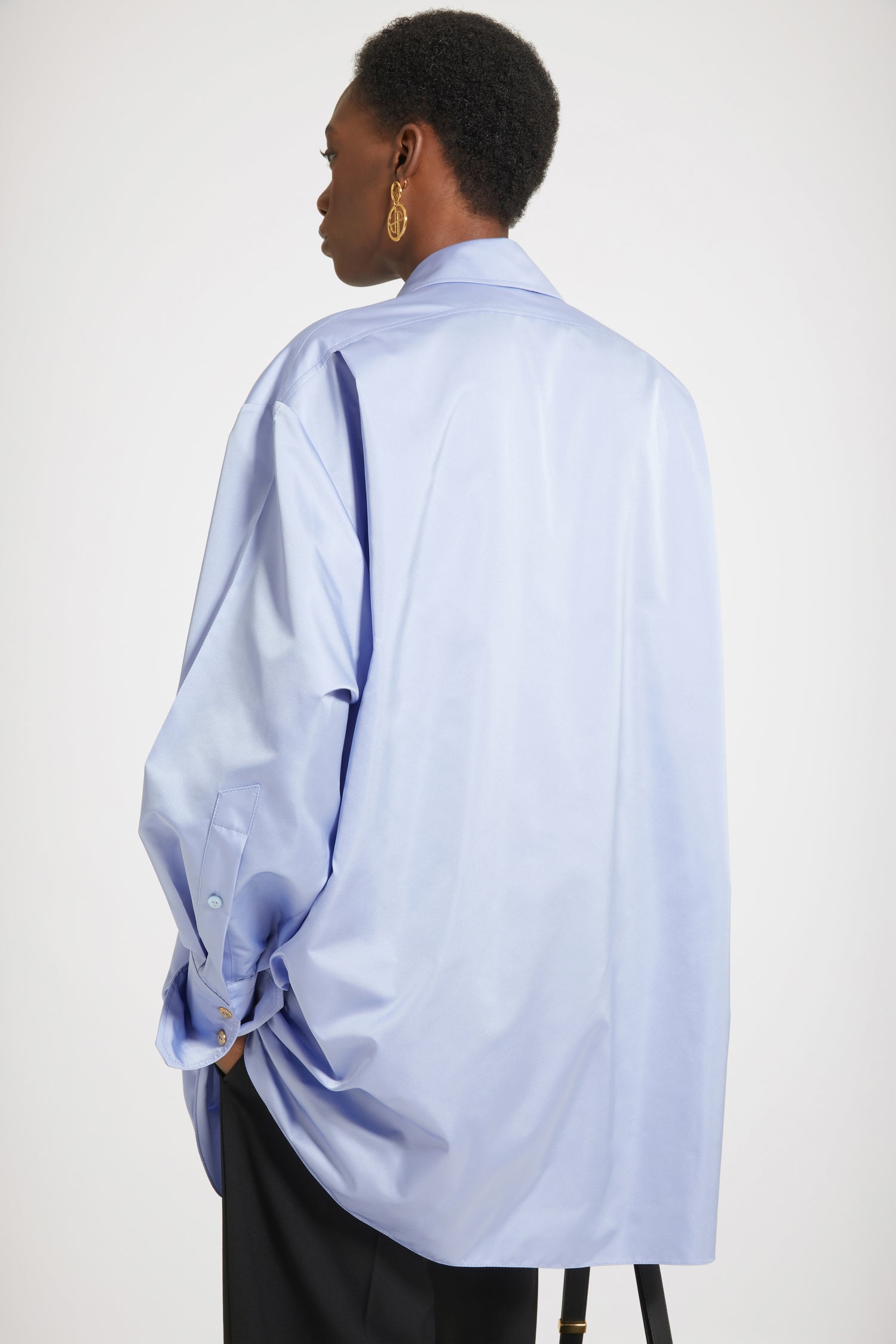 Patou - Mini shirt dress in eco-friendly satin - Alaska Blue - Layered or on its own, a new shape to make your own.Alaska Blue recycled polyester satin dress. Short length. Loose silhouette. Shirt collar. Gold-tone JP-engraved buttons. Concealed button fastening. Buttoned cuffs.Oversize style.