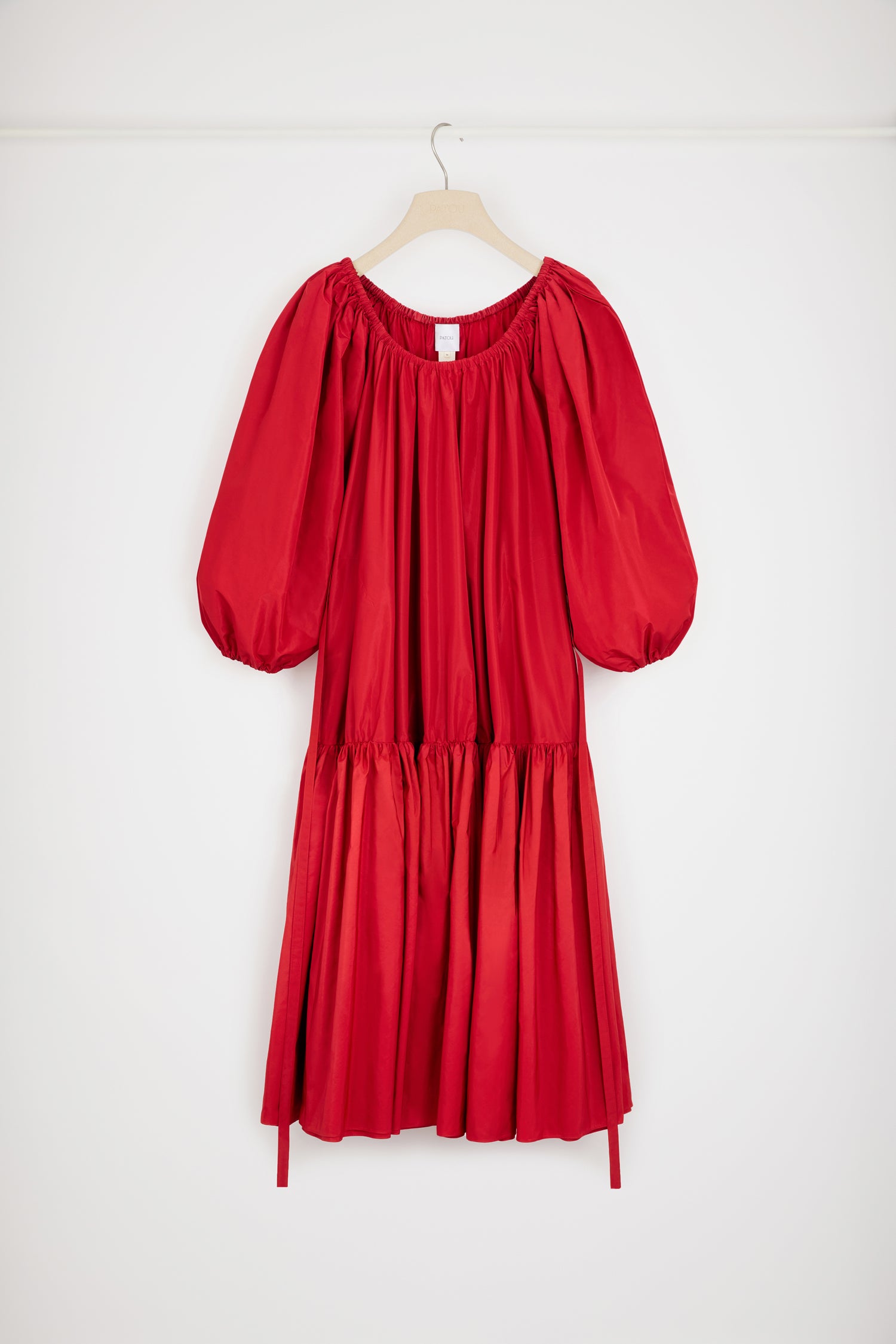 Patou - Off-the-shoulder maxi dress in eco-friendly faille - Lipstick Red - Va-va-volume.Lipstick Red recycled faille dress. Maxi length. Off-the-shoulder elasticated neckline. Volume sleeves with elasticated cuffs. Removable belt at the waist. Pockets at the sides. Tiered skirt.Voluminous dress.