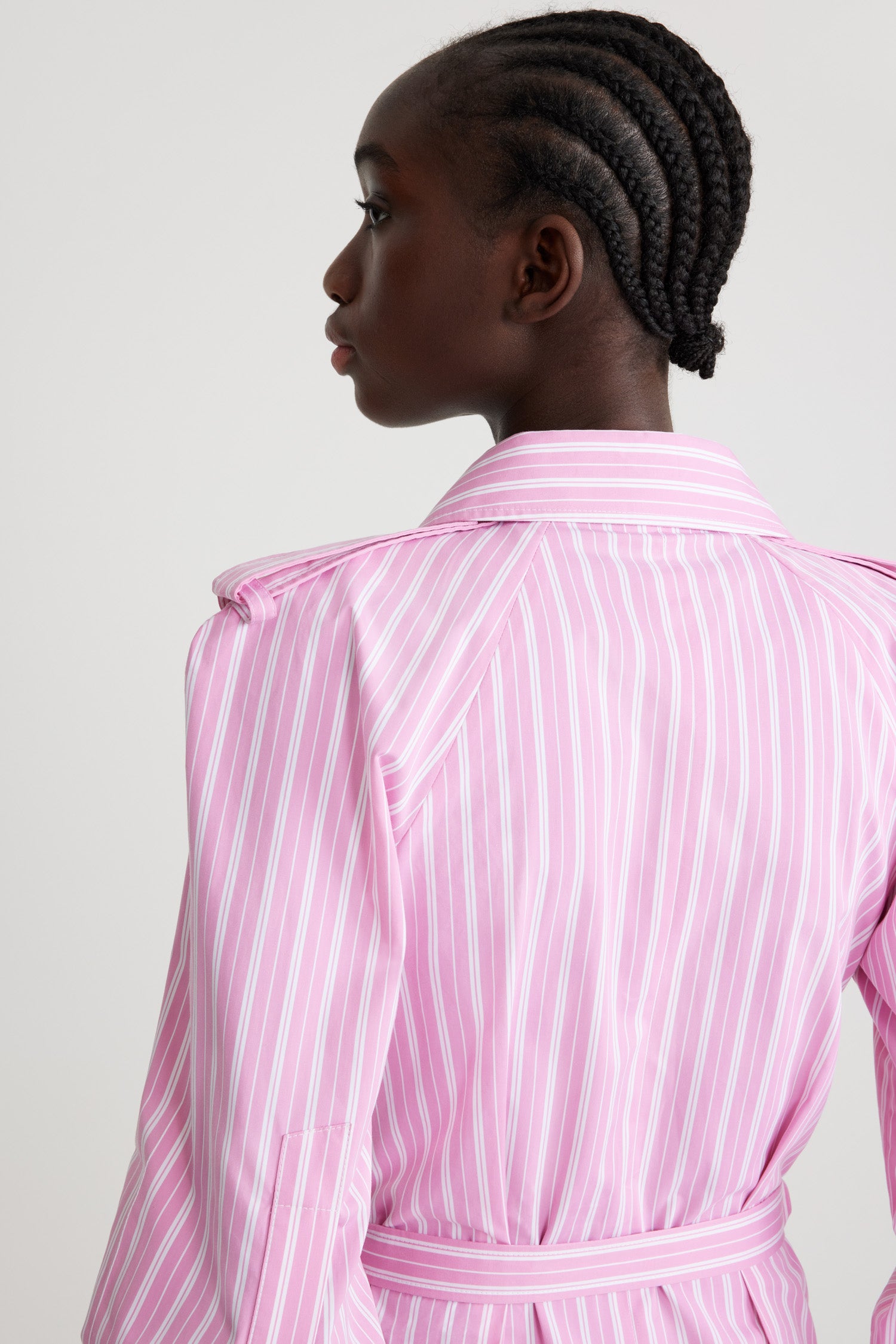 Patou - Maxi shirt dress in printed sustainable cotton - Pink Stripes - Pink sustainable cotton poplin dress. Striped pattern. Maxi length. Full volume tiered skirt. Shirt collar. JP-engraved mother-of-pearl buttons. Shoulder tabs. Raglan sleeves. Buttoned cuffs. Removable belt at the waist with gold-tone buckle.