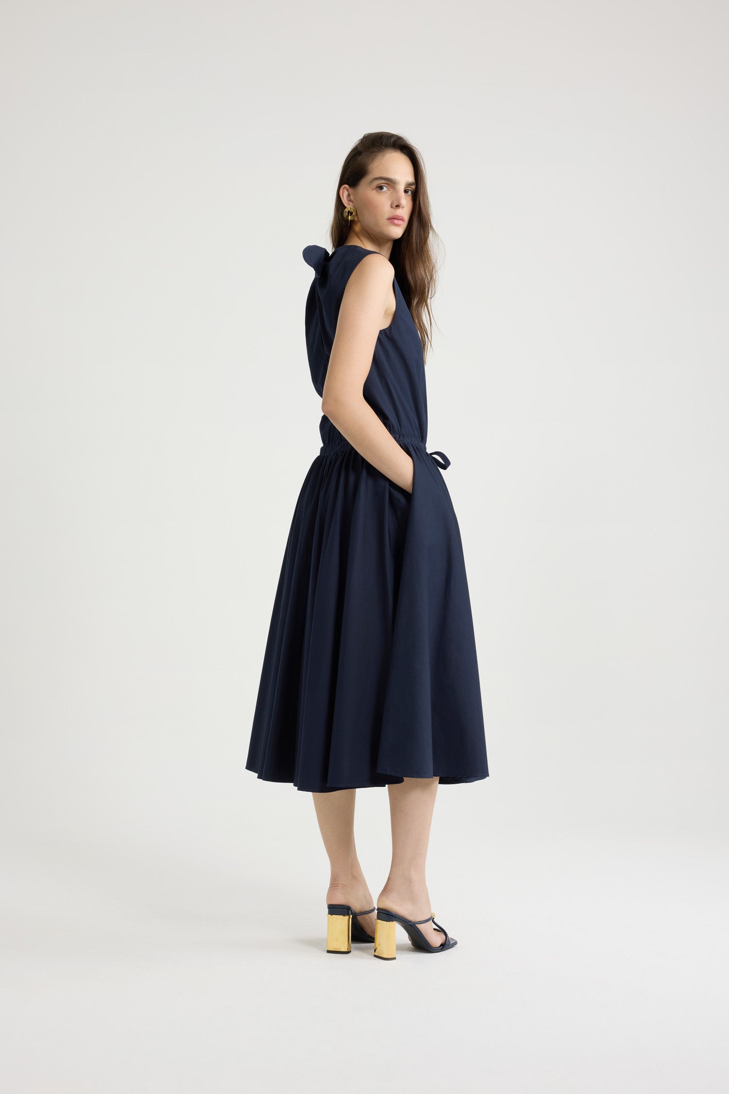 Patou - Buttoned midi dress in organic cotton poplin - Navy Black - Navy Black organic cotton poplin dress. Midi length. Sleeveless. Maxi buttons at the front. Split back with bow at the top. Partly concealed self-tie belt at the waist. Pockets at the sides.