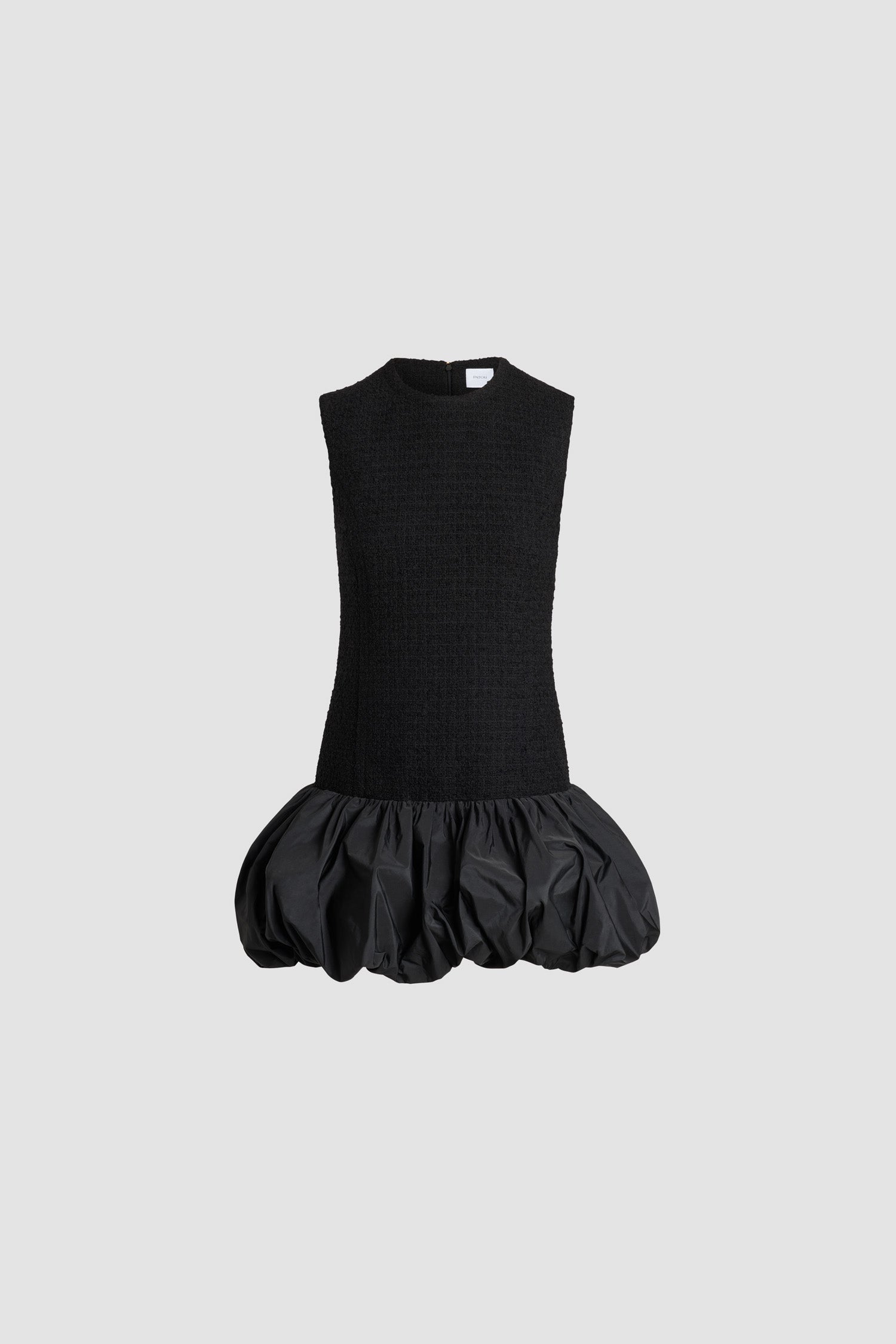 Patou - Robe à ourlet volanté en tweed de laine mélangée éco-responsable et faille - Black - Robe en tweed de laine mélangée éco-responsable noir. Modèle court. Col rond. Fermeture par zip au dos. Ourlet bouffant en faille de polyester. Modèle doublé.