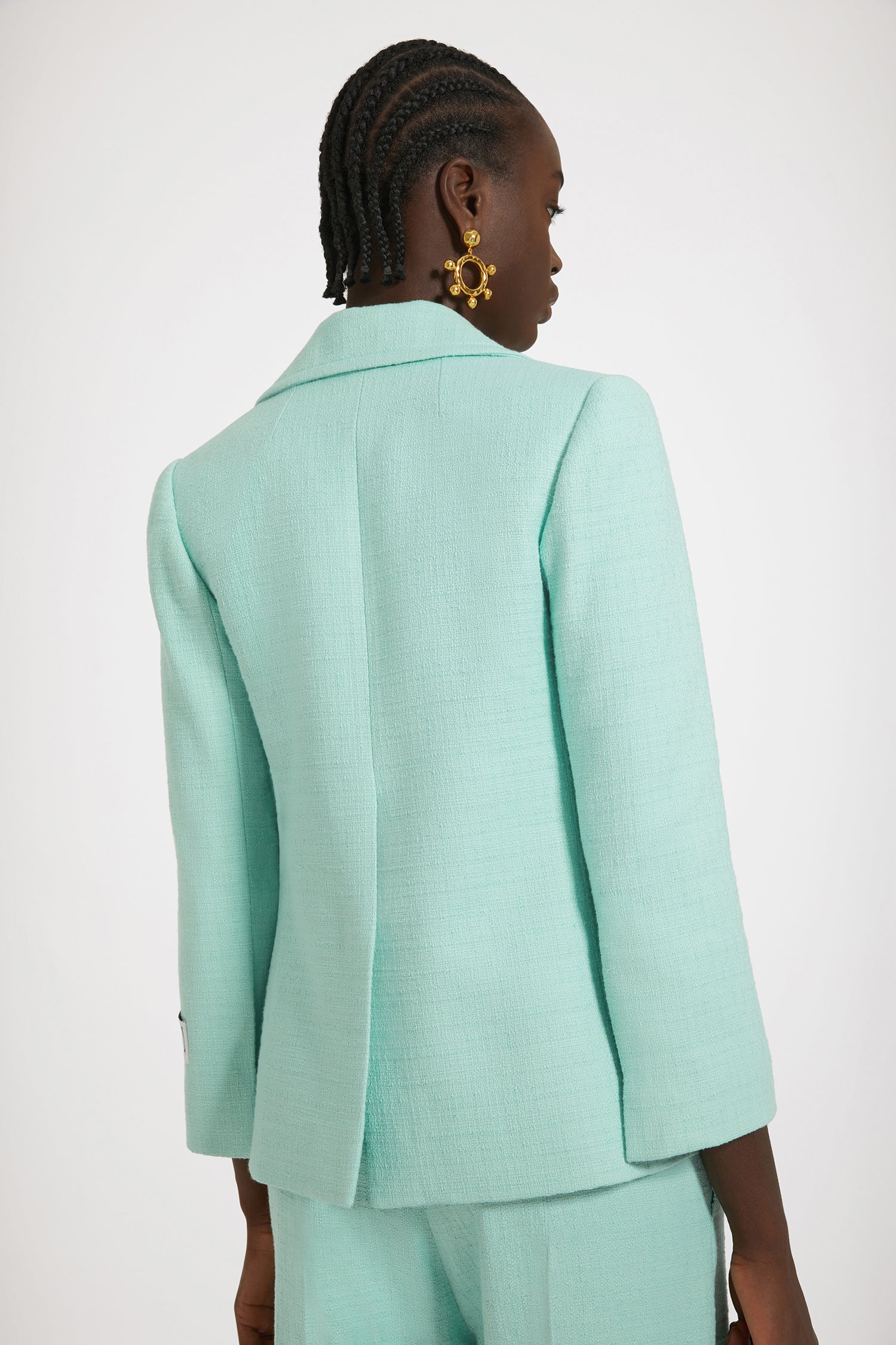 Patou - Tailored jacket in cotton tweed - Mint Green - One perfect tailored jacket, endless possibilities.Mint green cotton tweed jacket. Single-breasted style with off-center placket. Fitted tailored silhouette. Wide notch lapels. Gold-tone Patou-engraved buttons. Flap pockets. Cropped sleeves. Patou label on the left sleeve. Lined.