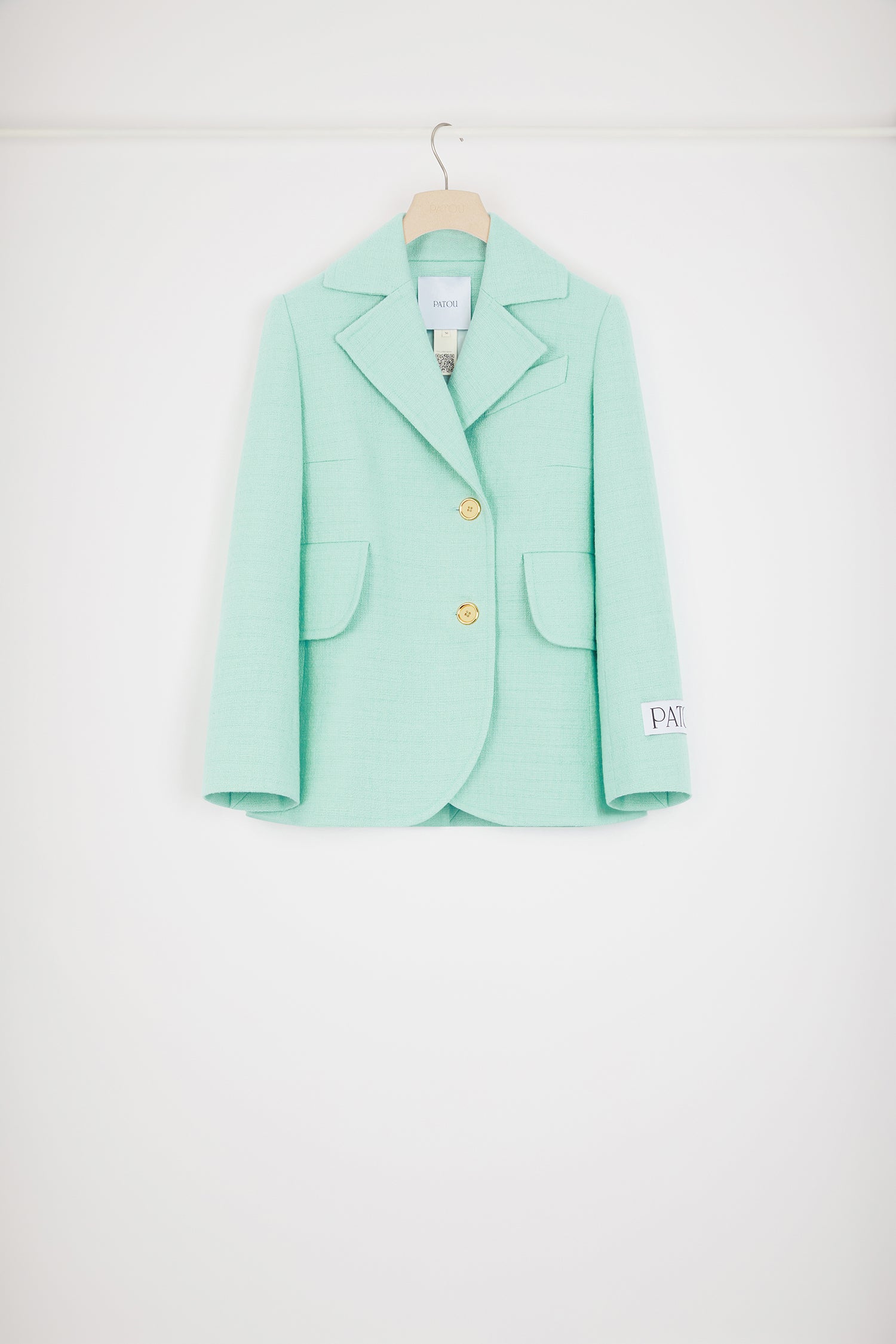 Patou - Tailored jacket in cotton tweed - Mint Green - One perfect tailored jacket, endless possibilities.Mint green cotton tweed jacket. Single-breasted style with off-center placket. Fitted tailored silhouette. Wide notch lapels. Gold-tone Patou-engraved buttons. Flap pockets. Cropped sleeves. Patou label on the left sleeve. Lined.