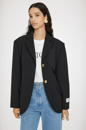 Relaxed belted jacket in technical wool