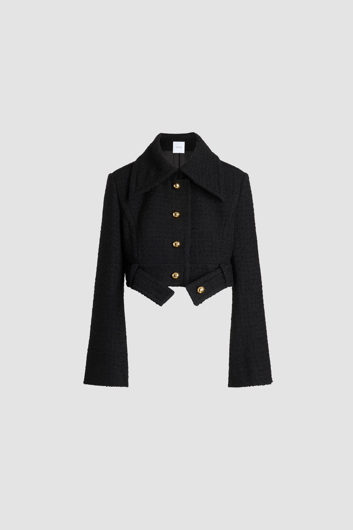 Patou - Belted cropped jacket in sustainable wool blend tweed - No Label Black - Black sustainable wool blend tweed jacket. Cropped silhouette. Single-breasted construction. Wide collar. Button front fastening with gold-tone JP monogram buttons. Buttoned belt at the waist that can be worn open. Slightly flared sleeves. Lined.