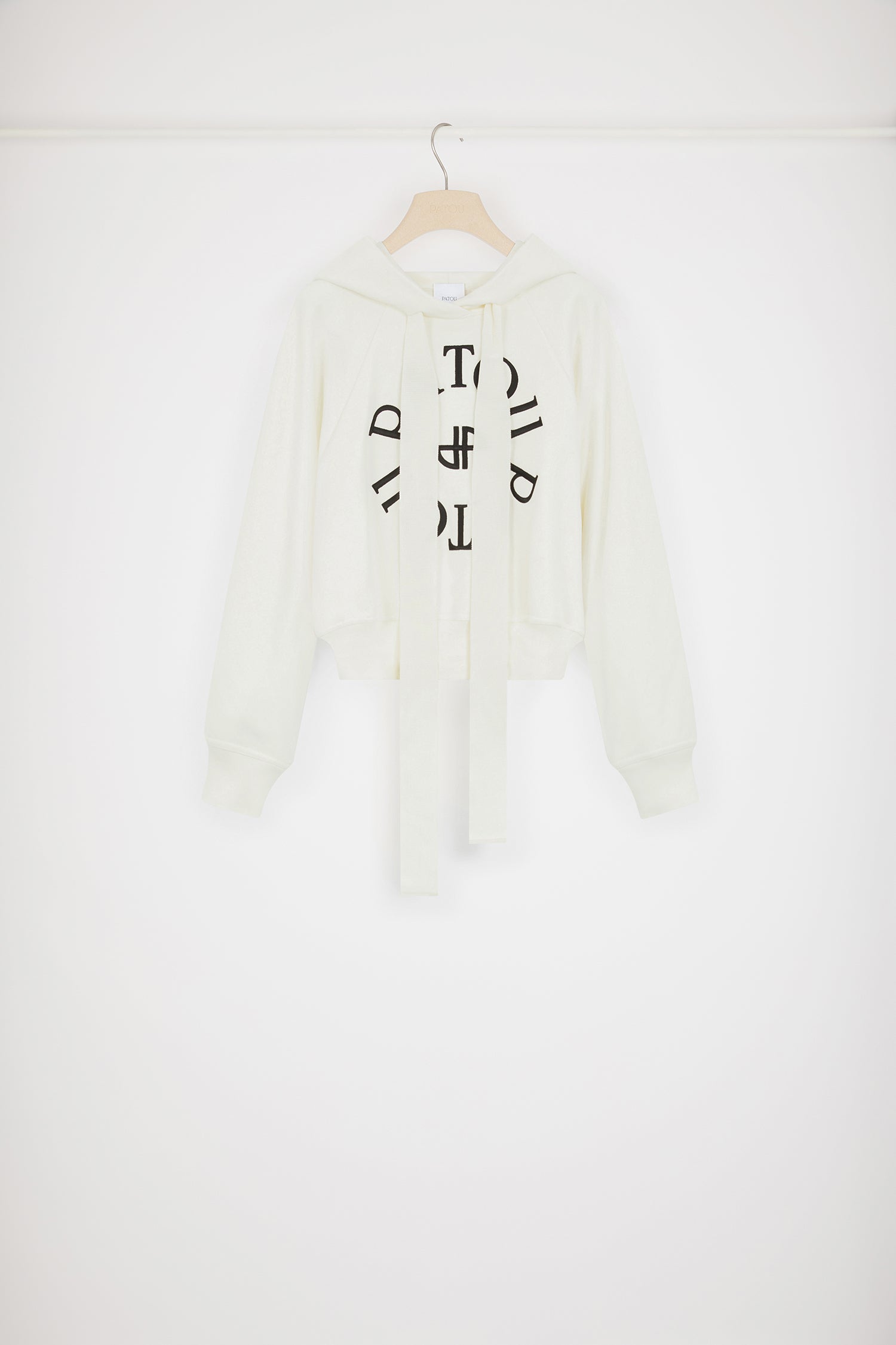 Patou - Medallion hoodie in organic cotton - Natural - Five letters and a grosgrain bow, a Patou recipe for success.Natural white organic cotton sweatshirt. Relaxed silhouette. Hooded collar with grosgrain drawstring. Patou medallion logo embroidered at the front. Raglan sleeves. Ribbed cuffs and waist.