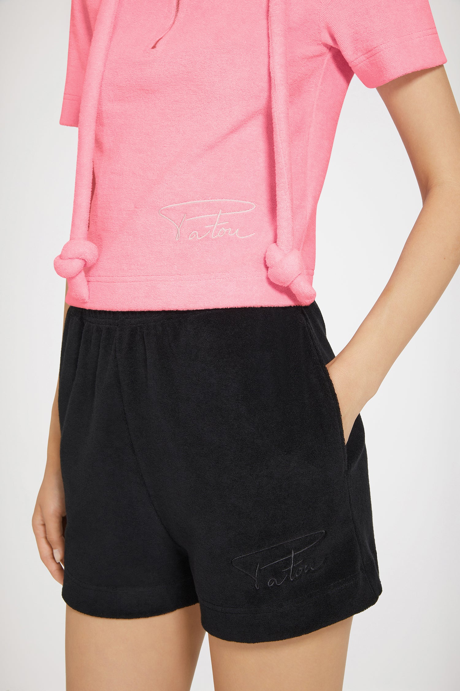 Patou - Half-zip polo shirt in organic cotton terry - Pink - Patou goes to the beach.Pink organic cotton terry polo shirt. Fitted silhouette. Wide collar with gold-tone zip. Thick self-fabric drawstring. Handwritten Jean Patou's signature embroidery at the front.