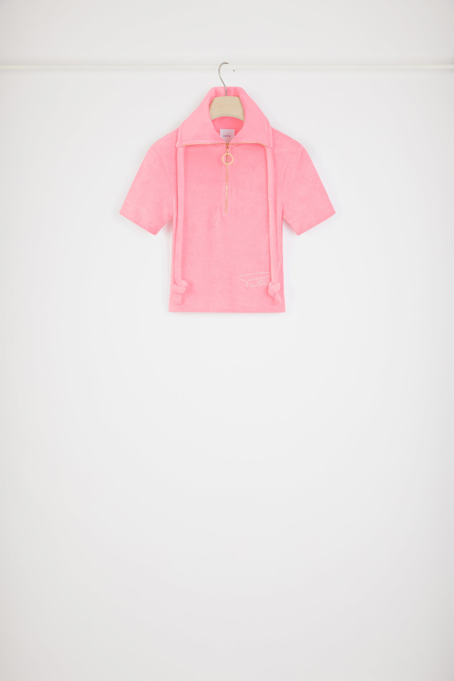 Patou - Half-zip polo shirt in organic cotton terry - Pink - Patou goes to the beach.Pink organic cotton terry polo shirt. Fitted silhouette. Wide collar with gold-tone zip. Thick self-fabric drawstring. Handwritten Jean Patou's signature embroidery at the front.
