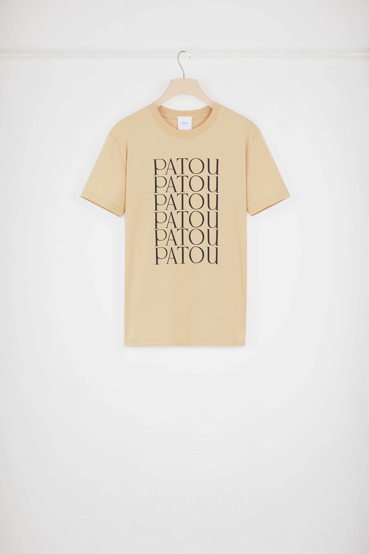 Patou - Patou Patou t-shirt in organic cotton - Beige - Patou! Patou! Patou!Beige organic cotton t-shirt. Regular fit. Crewneck. Multiple Patou logos printed at the front.