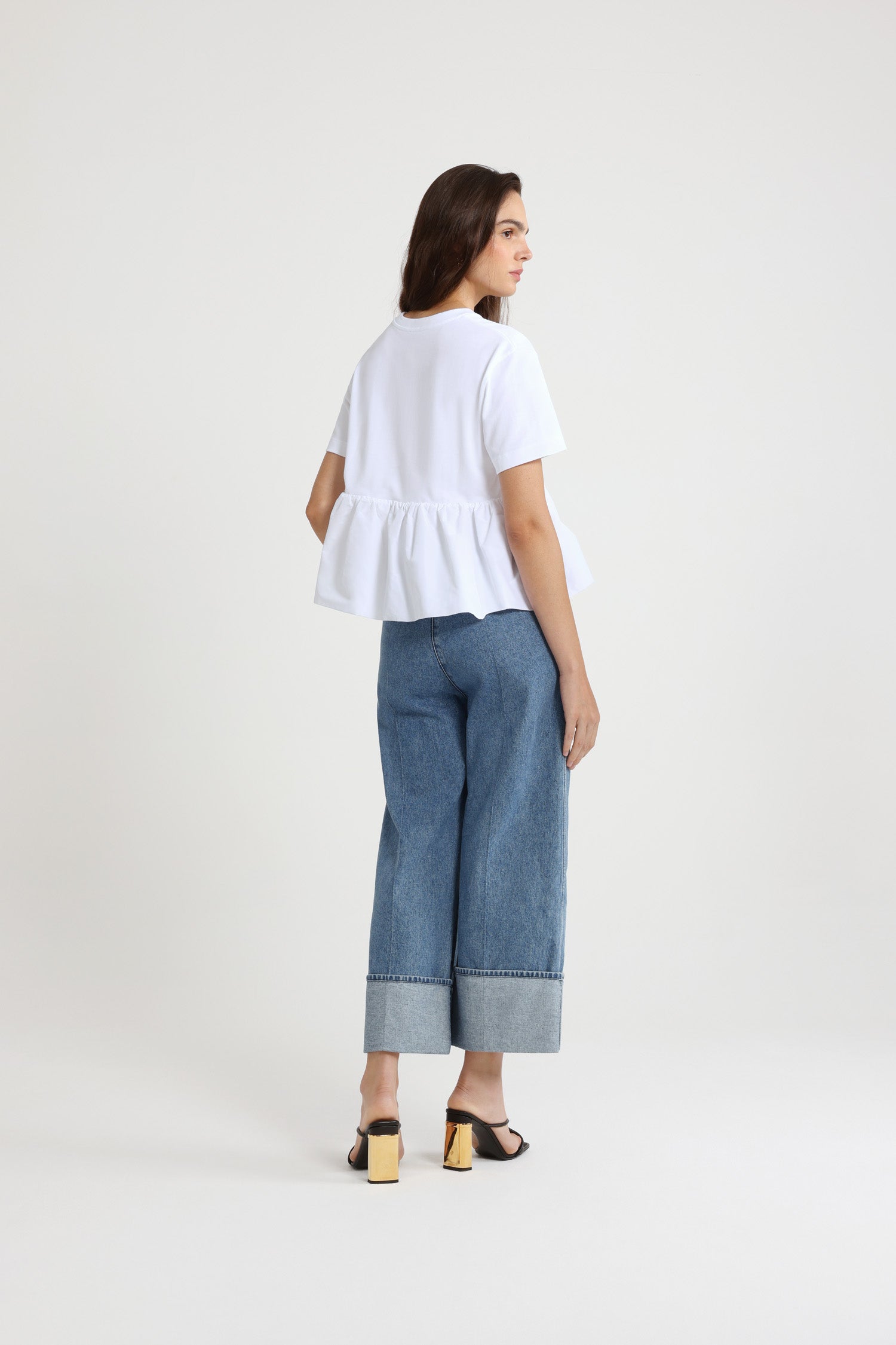 Patou - Ruffle hem t-shirt in organic cotton and faille - White - White organic cotton t-shirt. Thick jersey. Mixed media design with a contrast faille hem. Crewneck. Embroidered JP calligraphy monogram at the chest. Ruching at the waist.