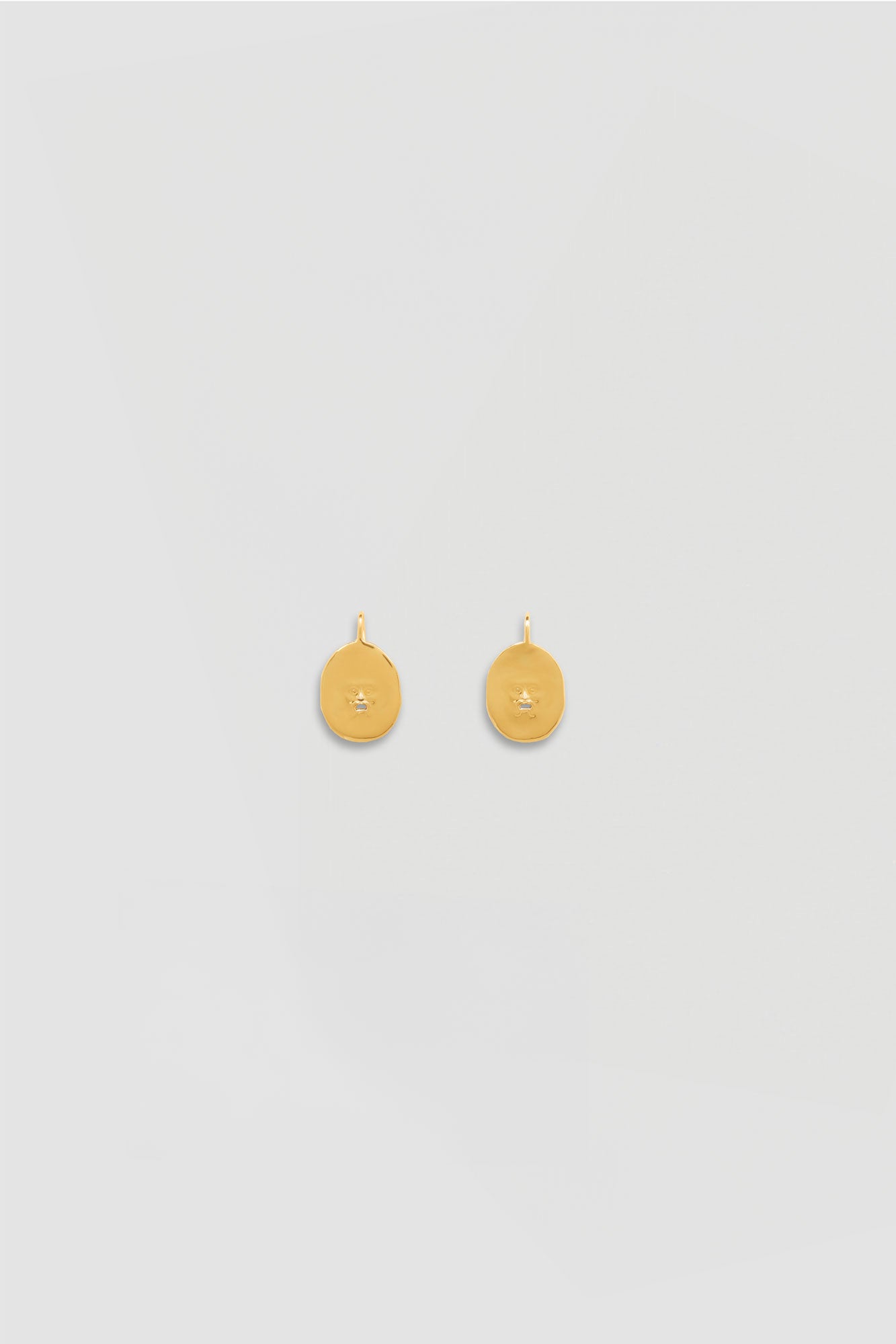 Patou - Small face brass earrings - Gold - An iconic face becomes timeless as contemporary jewellery, Small gold-plated brass earrings with “Bocca della Verità”-inspired design.