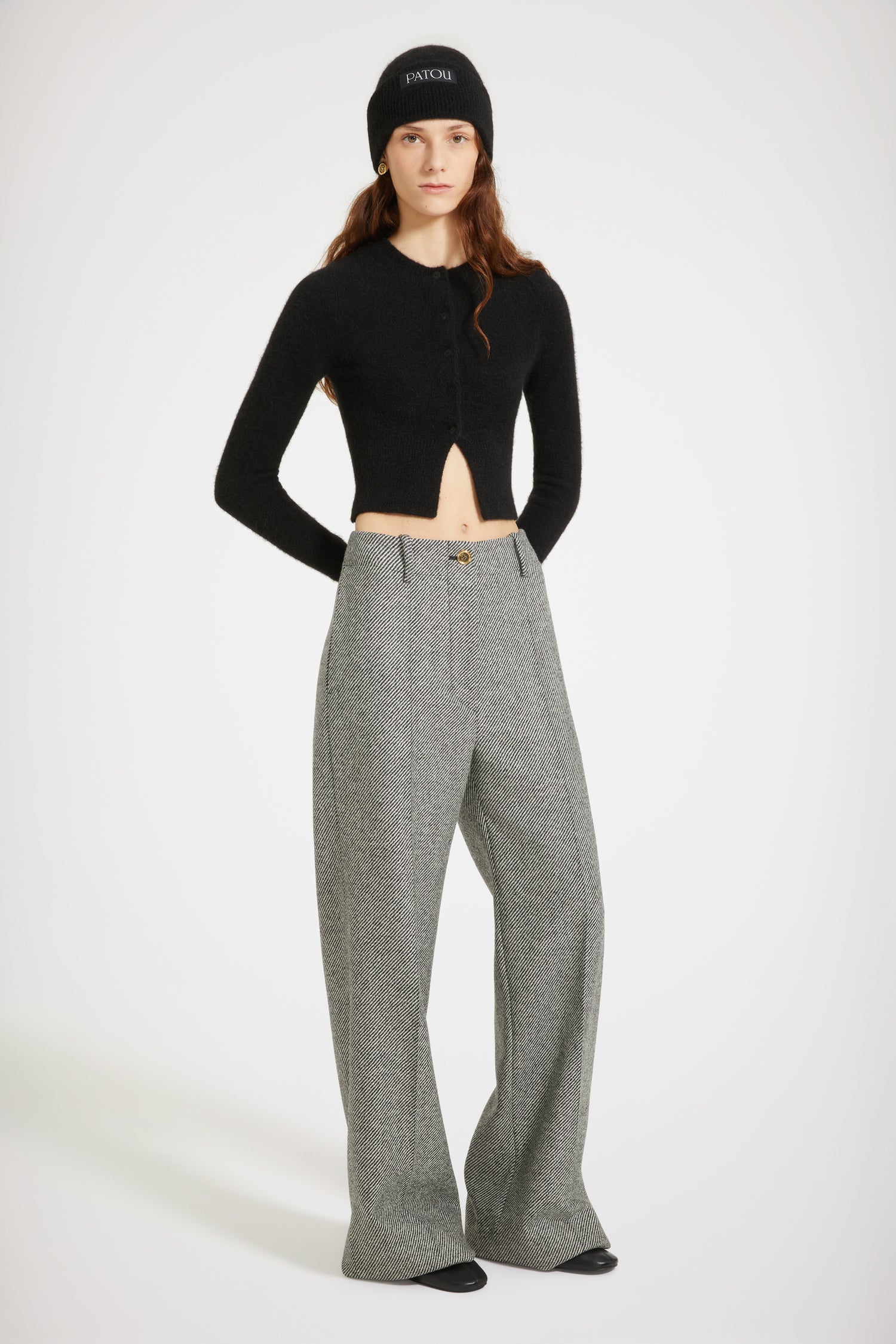 Patou - Cropped cardigan in sustainable alpaca blend - Black - Say oui to the cardi.Black baby alpaca blend cardigan. Fitted cropped silhouette. Round neckline. Ribbed collar, cuffs and waist. JP-engraved mother-of-pearl buttons.This cardigan is very fitted.