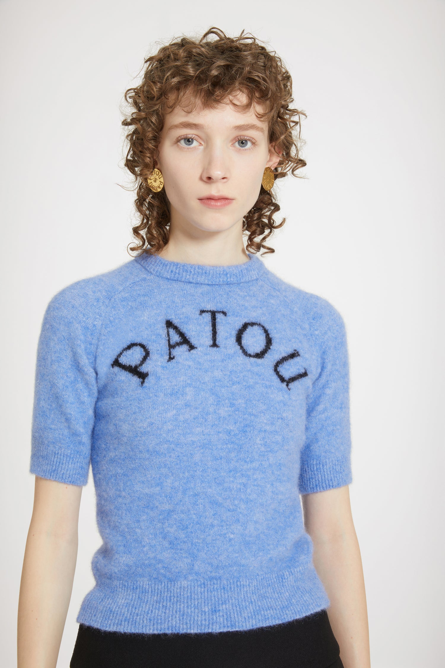 Patou - Patou jacquard top in sustainable alpaca blend - Alaska Blue - A warm Patou embrace.Alaska Blue baby alpaca blend top. Round neckline. Ribbed collar, cuffs and waist. Short sleeves. Patou jacquard at the front.Close-fitting style.