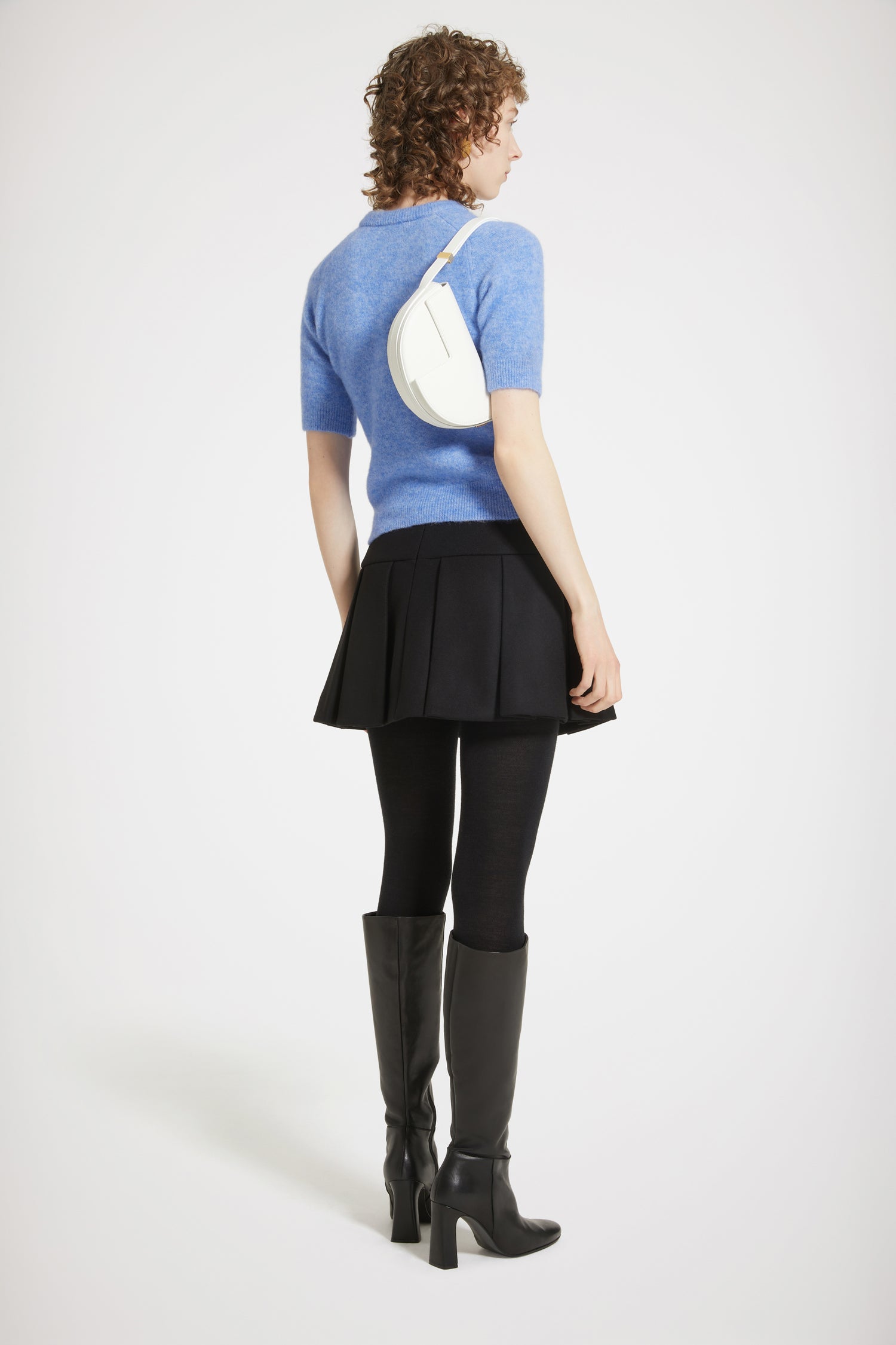 Patou - Patou jacquard top in sustainable alpaca blend - Alaska Blue - A warm Patou embrace.Alaska Blue baby alpaca blend top. Round neckline. Ribbed collar, cuffs and waist. Short sleeves. Patou jacquard at the front.Close-fitting style.