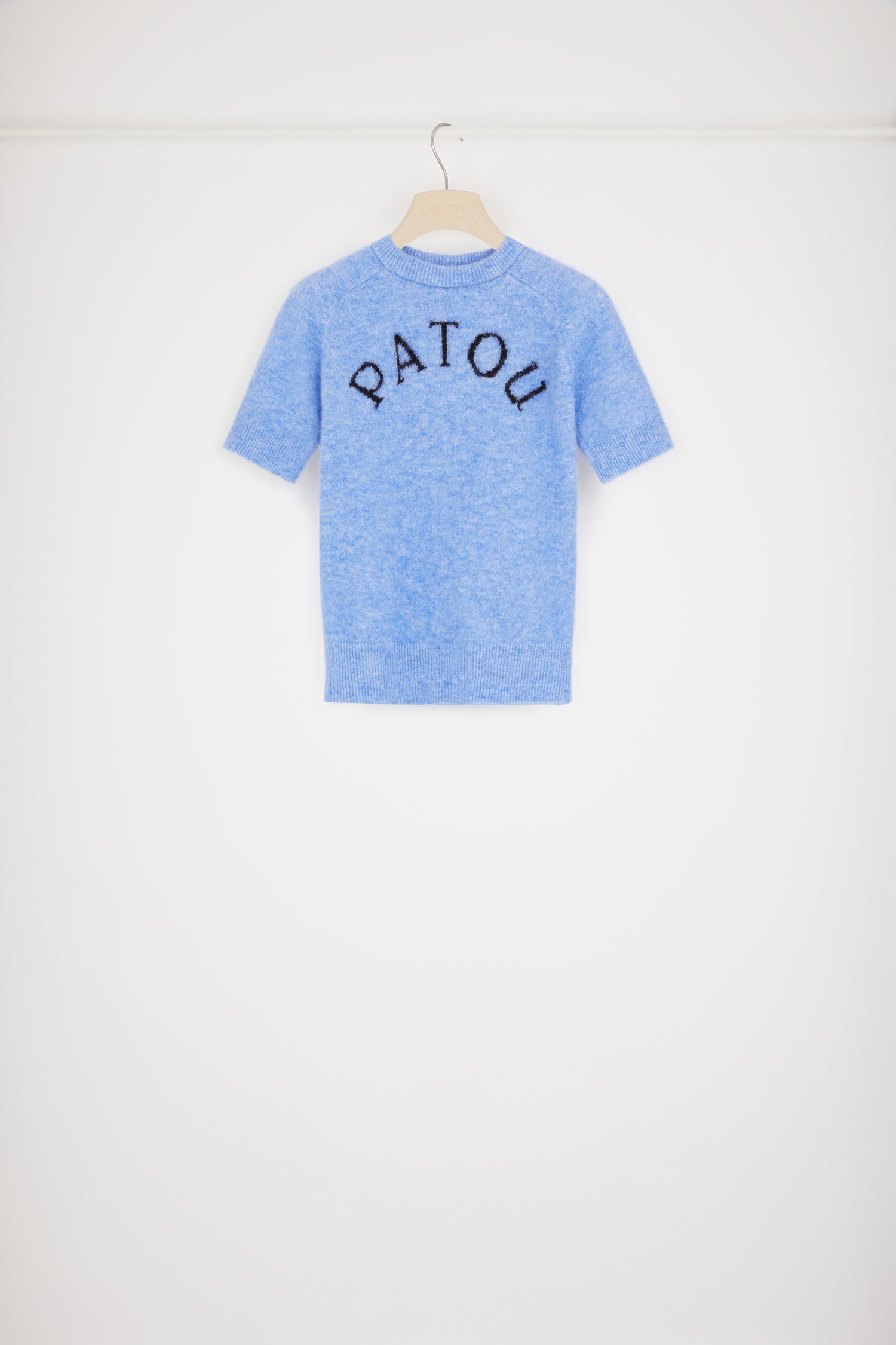 Patou - Patou jacquard top in sustainable alpaca blend - Alaska Blue - A warm Patou embrace.Alaska Blue baby alpaca blend top. Round neckline. Ribbed collar, cuffs and waist. Short sleeves. Patou jacquard at the front.Close-fitting style.