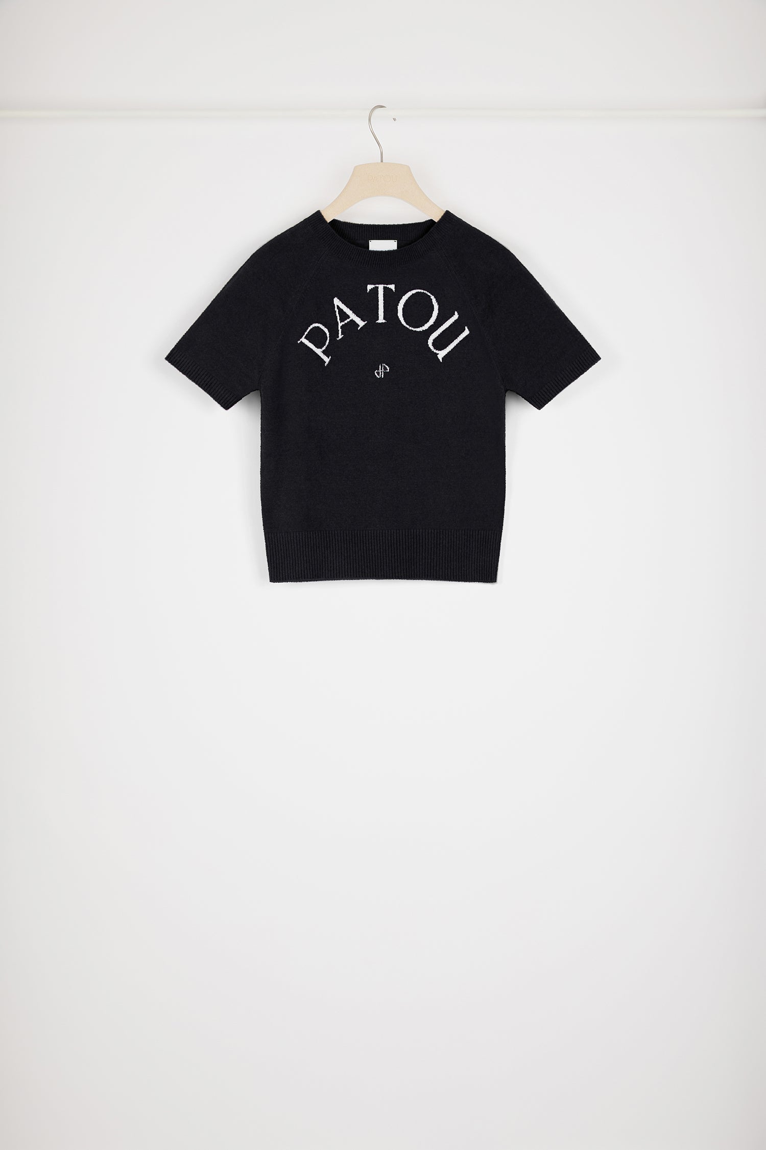 Patou - Patou jacquard knit top in cotton blend - Black - Patou, the five letters behind a new style tribe.Black cotton blend top. Terry knit. Round neck. Ribbed collar, cuffs and hem. Short sleeves Patou lettering logo and monogram jacquard at the front.