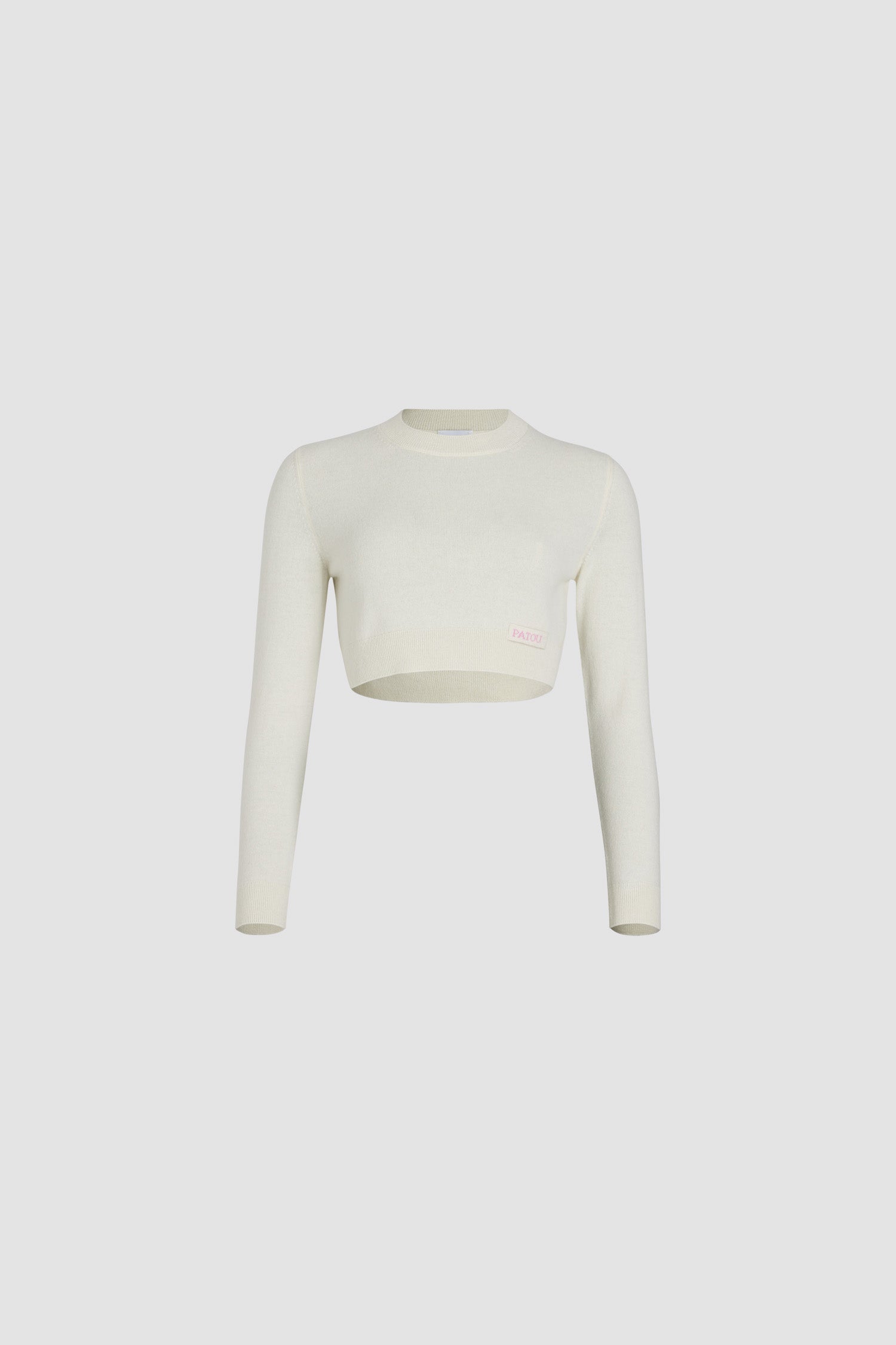 Patou - Maglione corto in misto lana e cachemire ecosostenibile - White - Maglione in misto lana e cashmere ecosostenibile bianco. Modello corto. Collo tondo. Etichetta Patou sul davanti.Questo modello è corto.