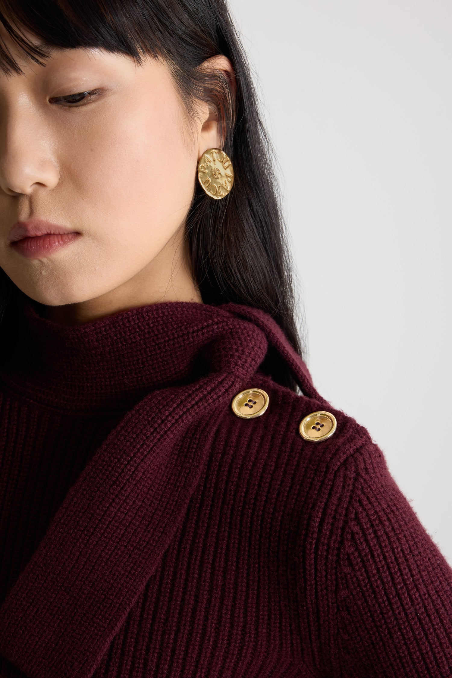 Patou - Scarf collar jumper in wool and cashmere - Vignola - Vignola maroon Merino wool and cashmere jumper. Rib knit. Mock neck with scarf detail. Gold-tone JP-engraved buttons on the shoulder. Patou logo label placed at the front.