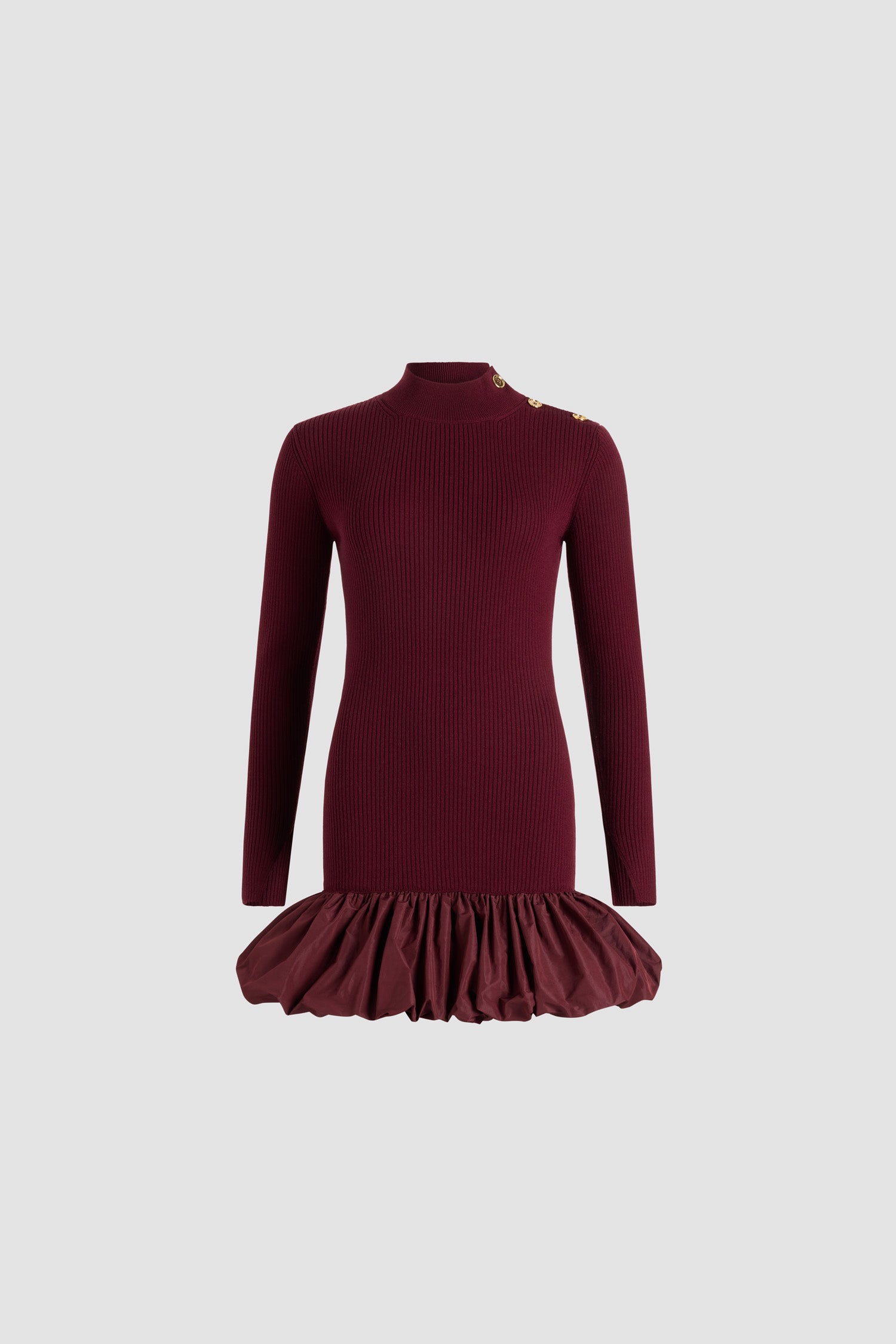 Patou - Ruffle hem ribbed mini dress in wool and faille - Syrah - Syrah burgundy Merino wool dress. Rib knit. Short length. Fitted silhouette. Mock neck. Gold-tone JP-engraved buttons on the shoulder. Elongated sleeves with split cuffs. Polyester faille ruffle hem.