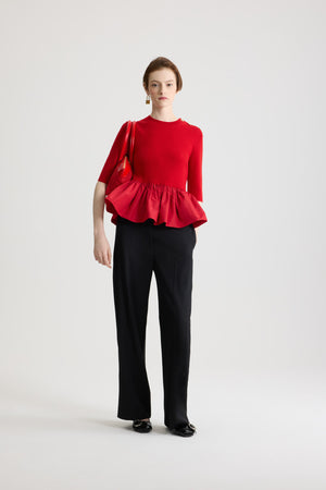 Ruffle hem ribbed jumper in wool and faille