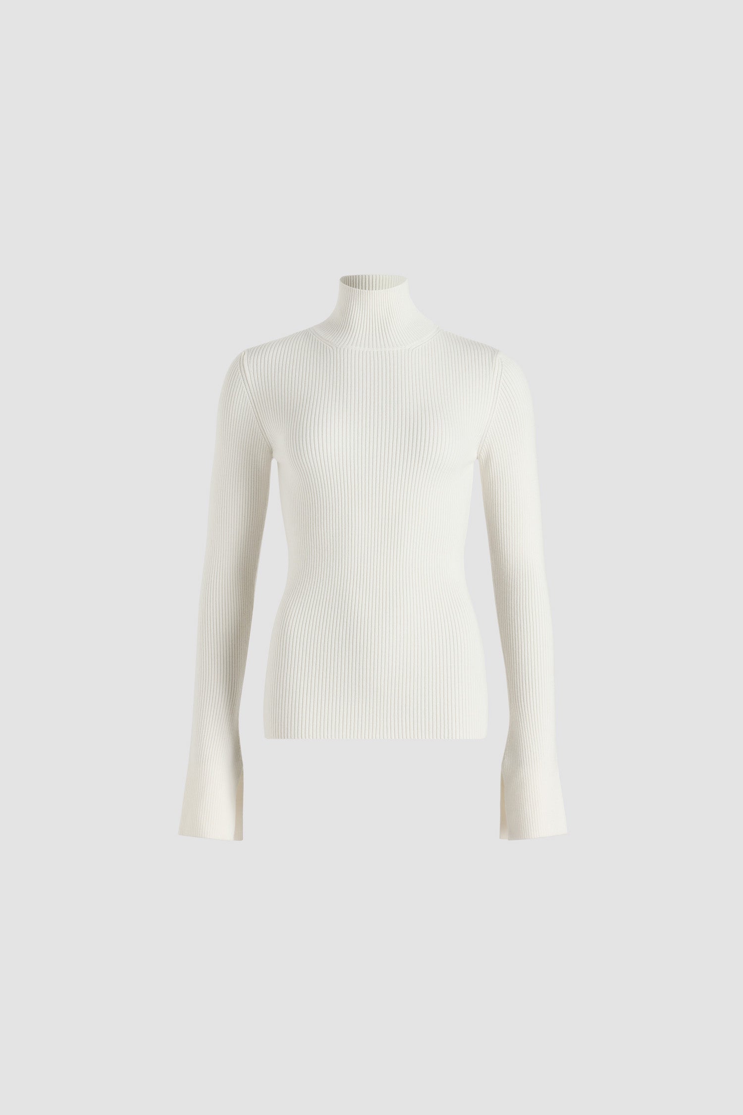 Patou - Maglione a costine in misto lana - Snowberry White - Maglione in misto lana merino Snowberry White. Maglia a costine. Silhouette aderente. Collo alto. Maniche allungate con polsini con spacco.