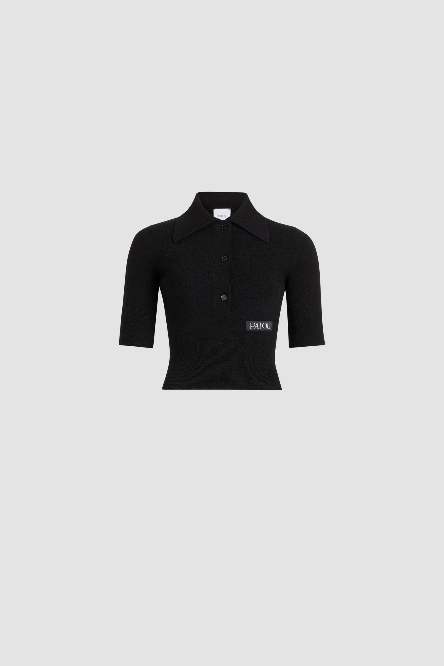 Patou - Polo in lana e cashmere - Black - Top in lana merino e cashmere nero. Silhouette aderente. Colletto largo a polo. Maniche di media lunghezza. Etichetta con logo Patou sul davanti. Polsini e fondo a costine.